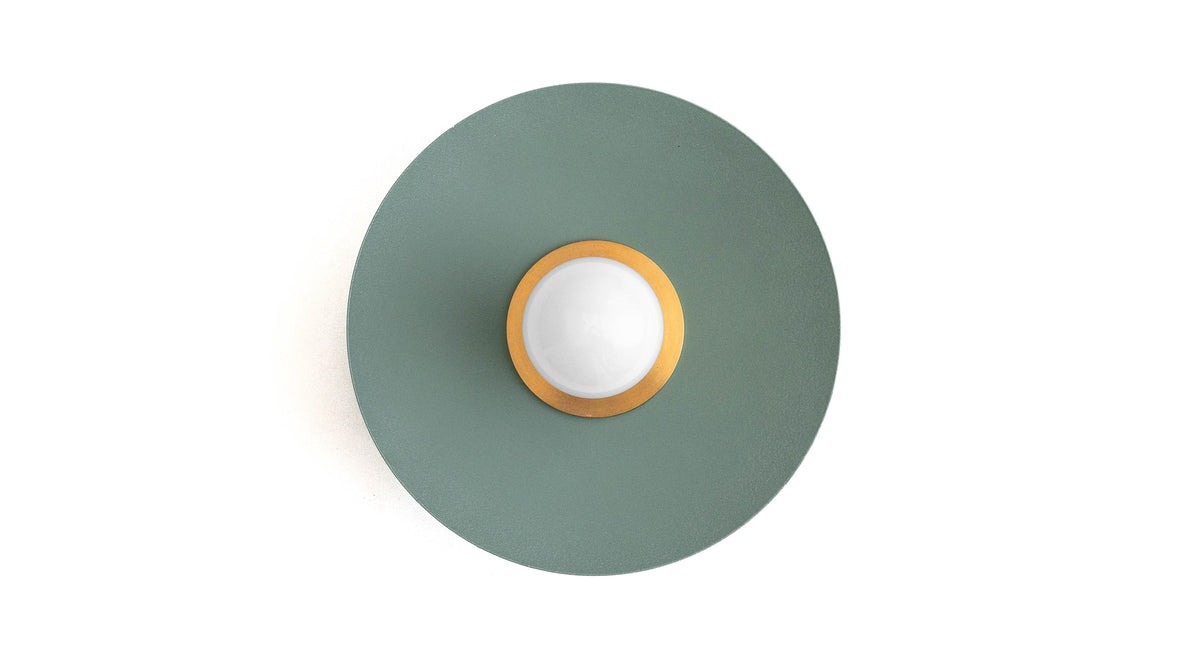 Round green raw brass wall sconce with exposed bulb and minimalist Scandinavian design. - SCONCE MODEL NO. 9660