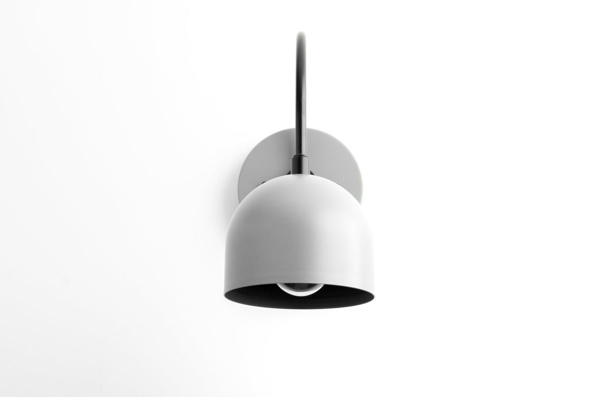 Matte gray mid-century modern semi-flush wall sconce with rounded shade and black arm. - SCONCE MODEL NO. 8586