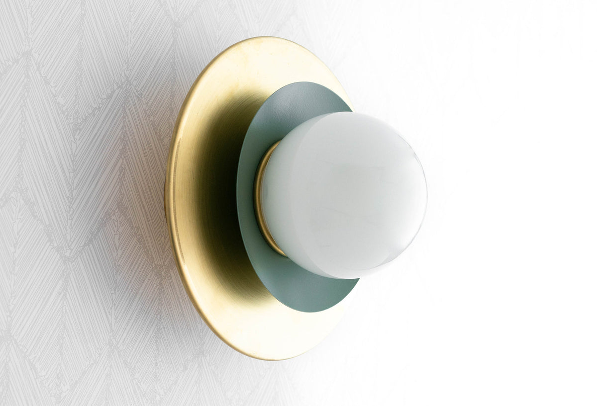 Semi-flush ceiling light with raw brass backplate and matte green metal base holding a white globe shade. - CEILING LIGHT MODEL NO. 5368