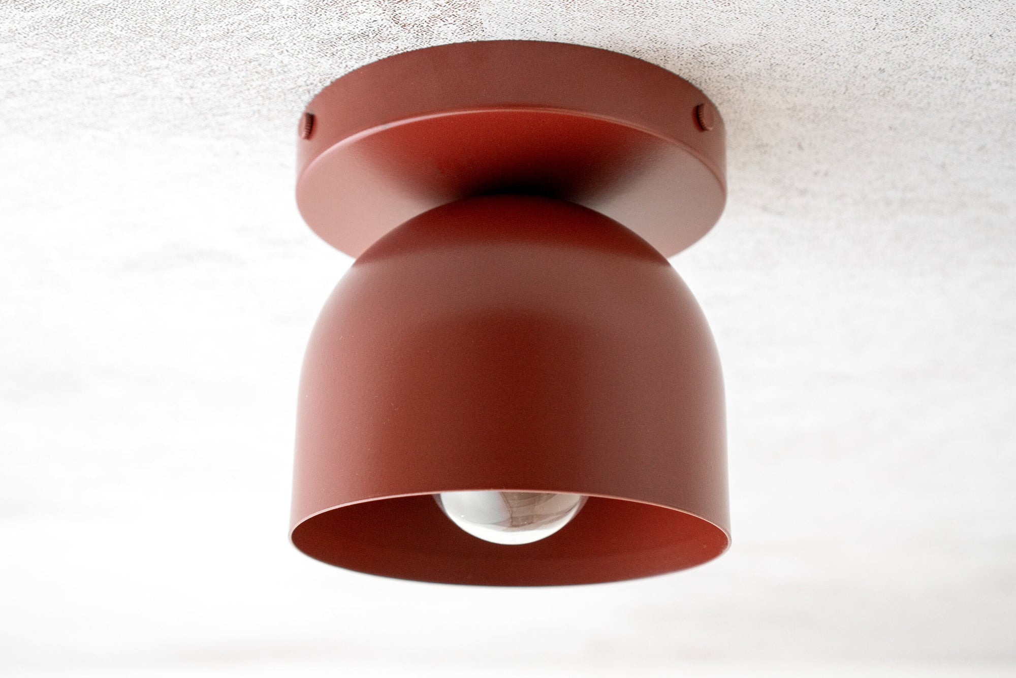 Matte brick red flush mount ceiling light with rounded shade and exposed bulb design. - CEILING LIGHT MODEL NO. 1107