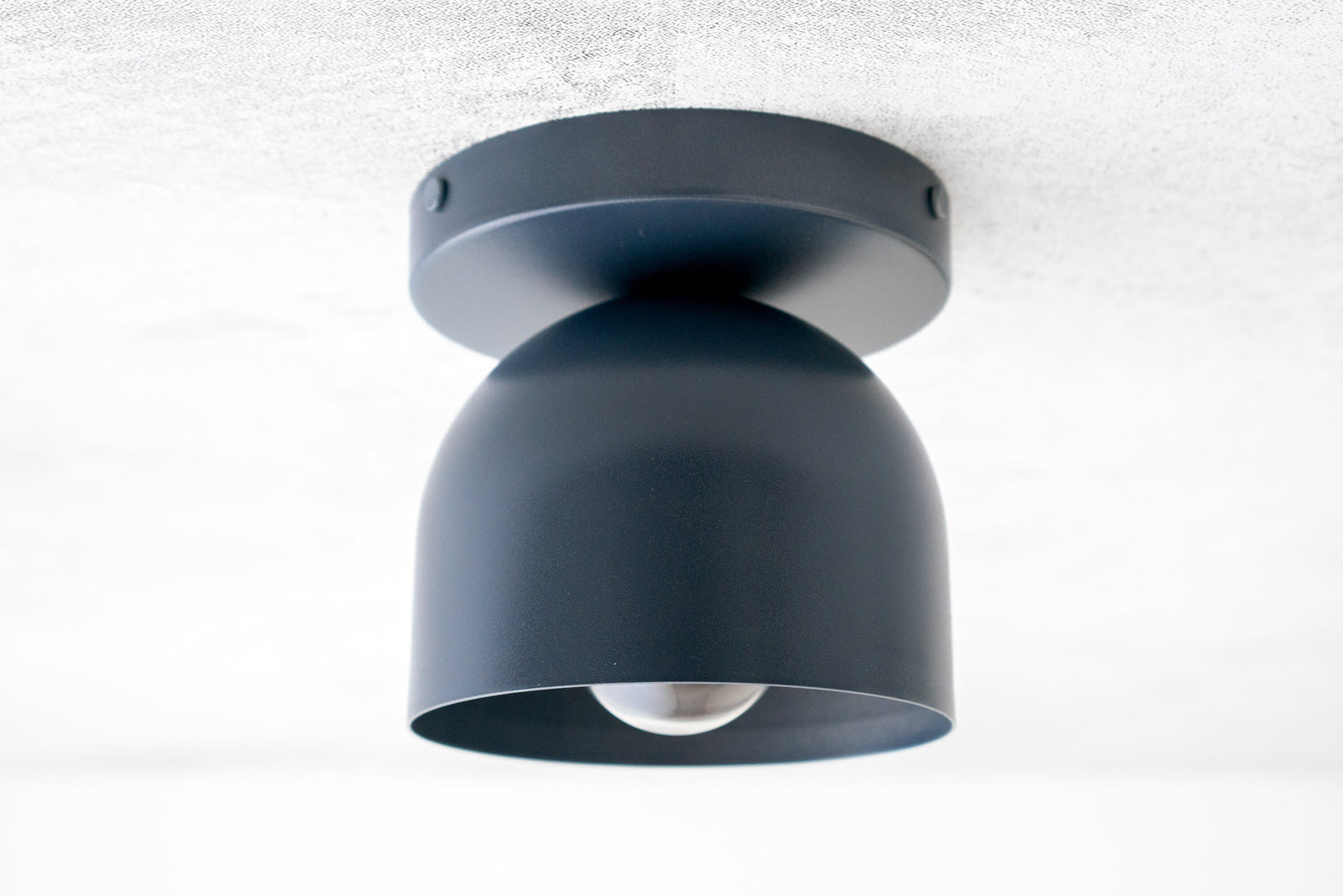 Matte black Scandinavian flush mount ceiling light with dome-shaped shade and exposed bulb. - CEILING LIGHT MODEL NO. 1107
