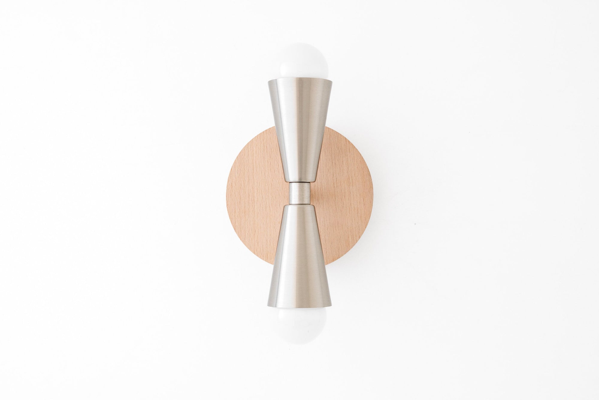 Scandinavian style sconce with beechwood backplate and brushed nickel double cone fixture with exposed bulbs. - SCONCE MODEL NO. 4717