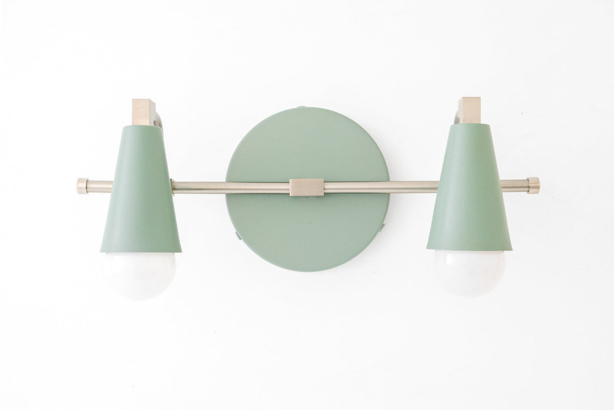 Brushed Nickel vanity light with two green cone-shaped shades and exposed bulbs, Scandinavian style. - VANITY LIGHT MODEL NO. 1229