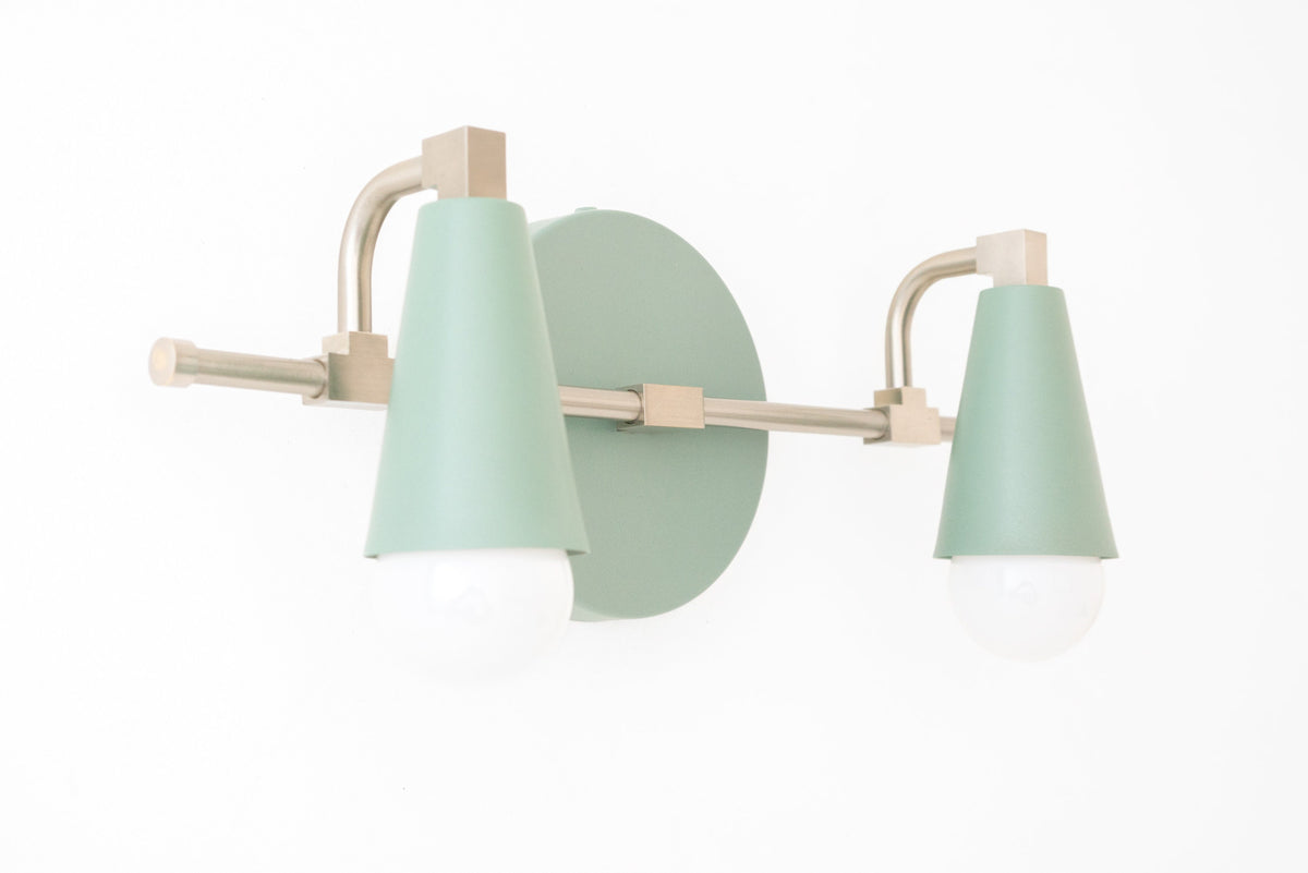 Scandinavian-style vanity light with two green conical shades and brushed nickel fixtures. - VANITY LIGHT MODEL NO. 1229