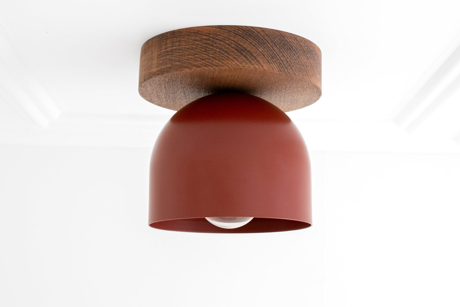 Flush mount ceiling light with oak wood base and smooth brick red dome shade. - CEILING LIGHT MODEL NO. 1107