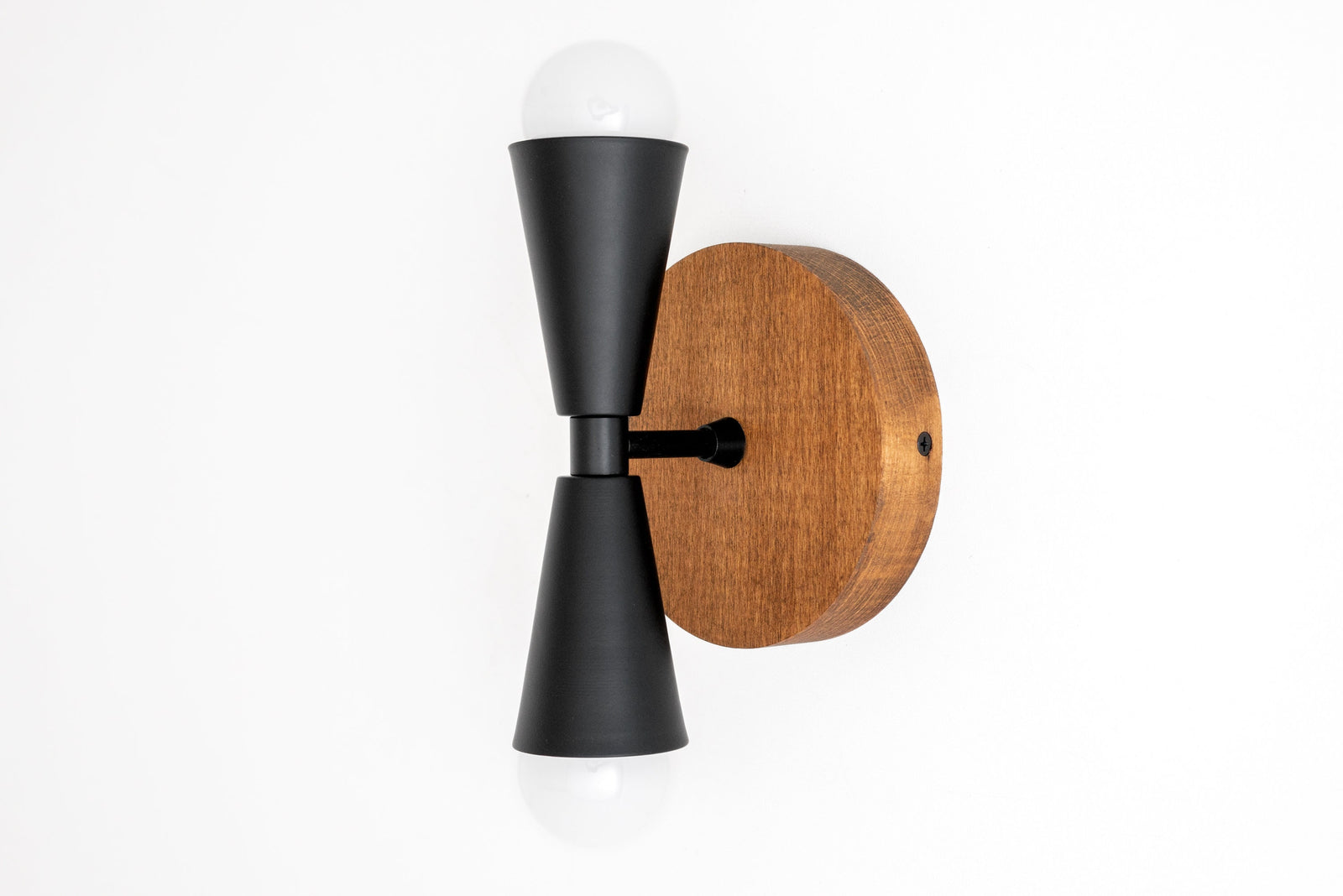 Black metal double cone wall sconce with exposed bulbs and round oak wood base. - SCONCE MODEL NO. 4717