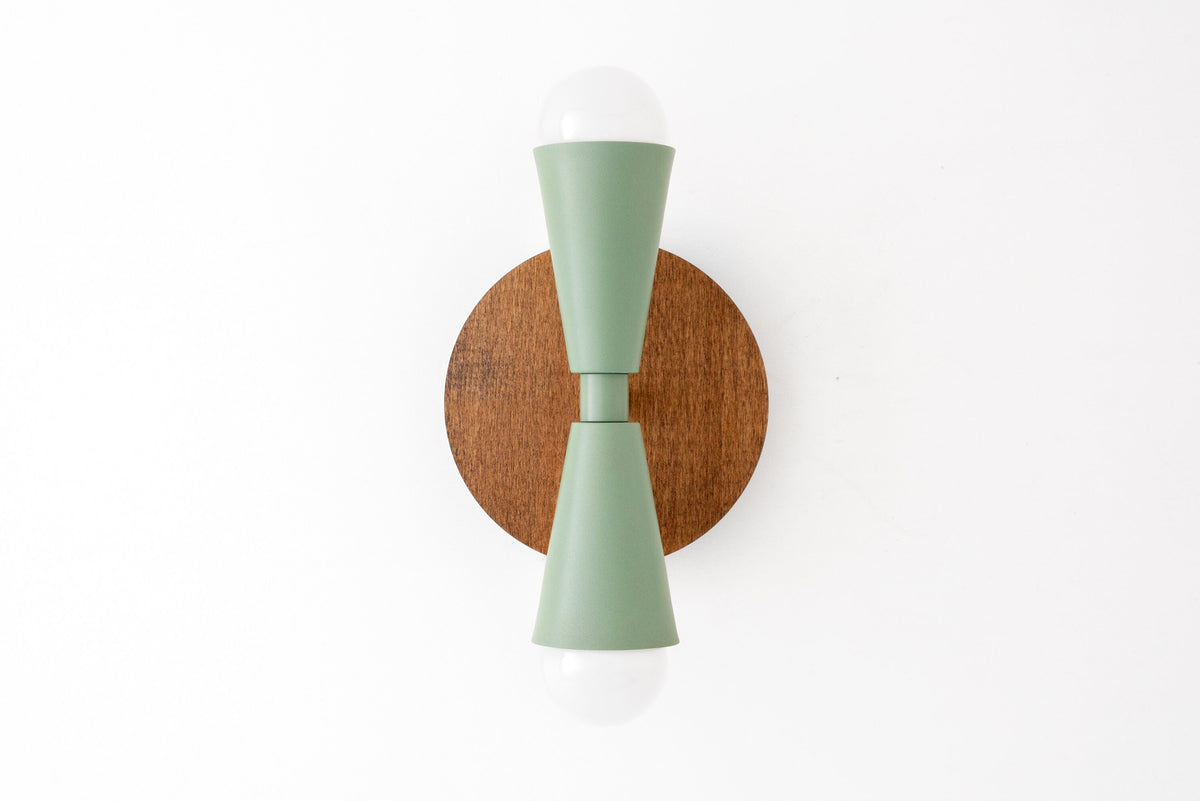 Scandinavian-style wall sconce with natural oak round base and matte green double cone shades with exposed bulbs top and. - SCONCE MODEL NO. 4717