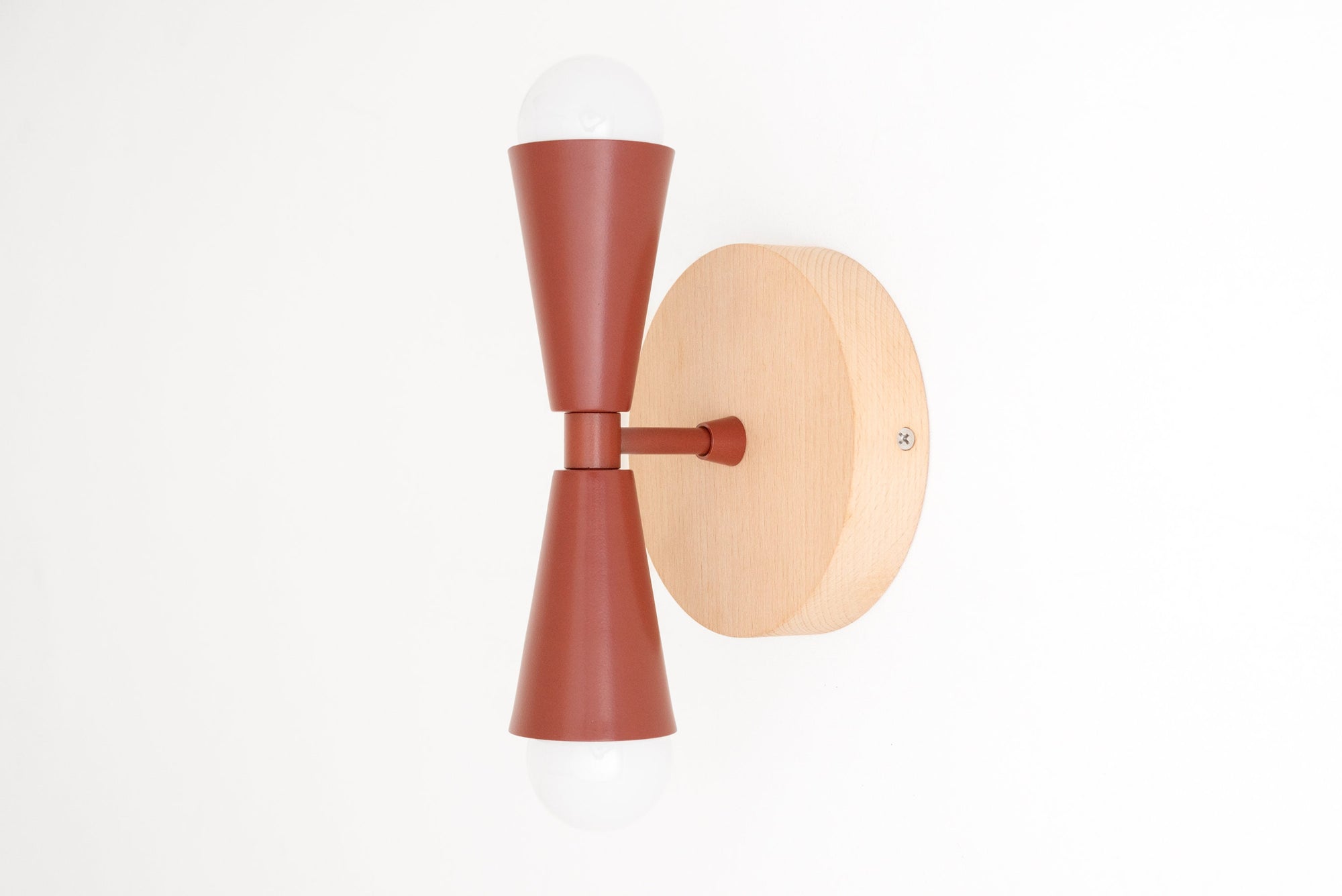 Semi-flush beechwood sconce with dual brick red metal cone shades and exposed bulbs. - SCONCE MODEL NO. 4717