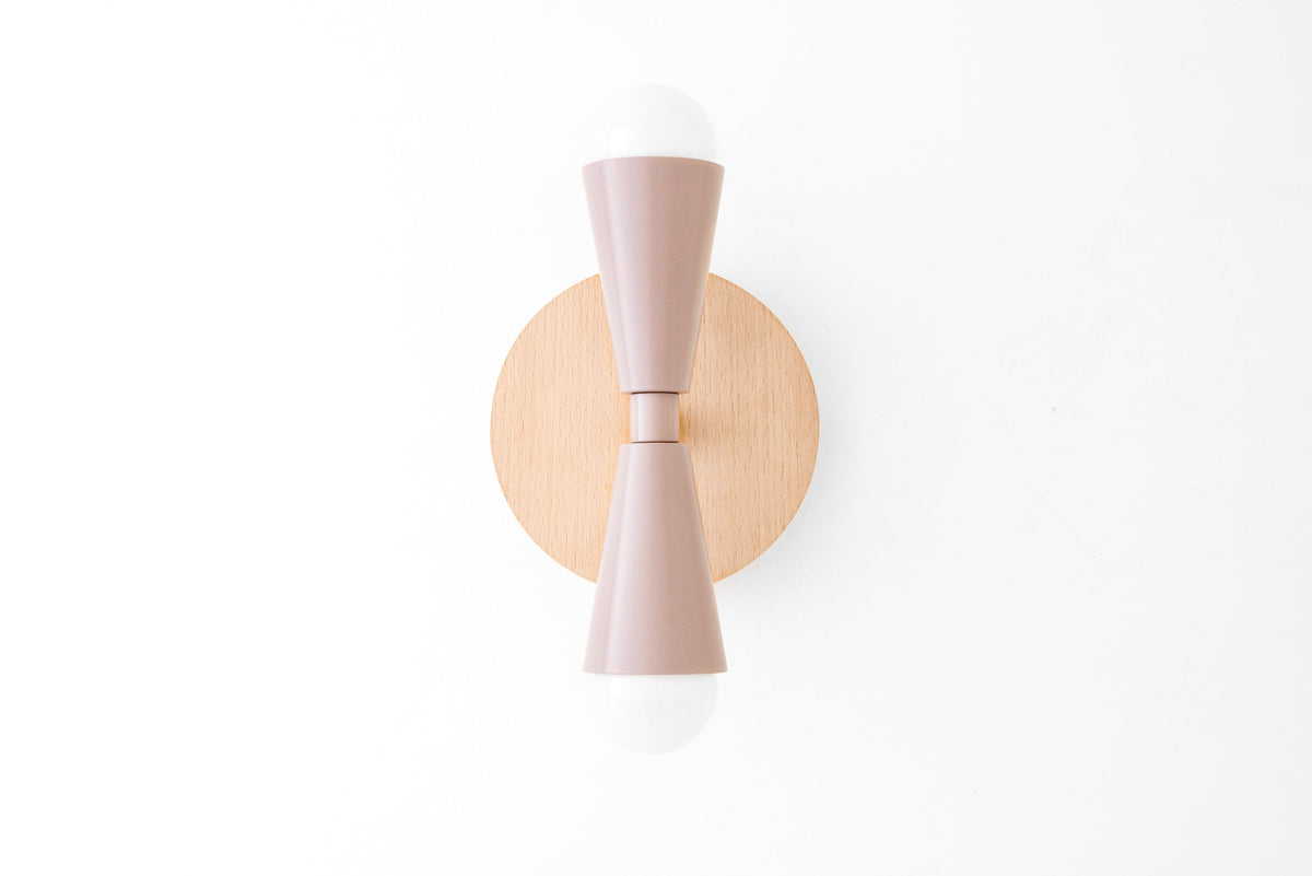 Scandinavian-style wall sconce in mauve with natural beechwood round base and two exposed bulbs. - SCONCE MODEL NO. 4717