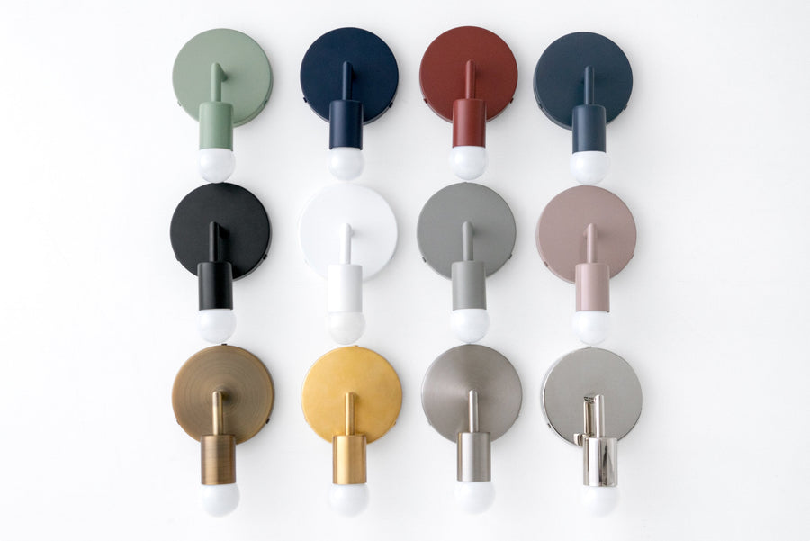 Ten bare bulb Scandinavian sconces in gray, coal blue, brick red, navy, black, white, mauve, antique brass, yellow, and. - SCONCE MODEL NO. 5480