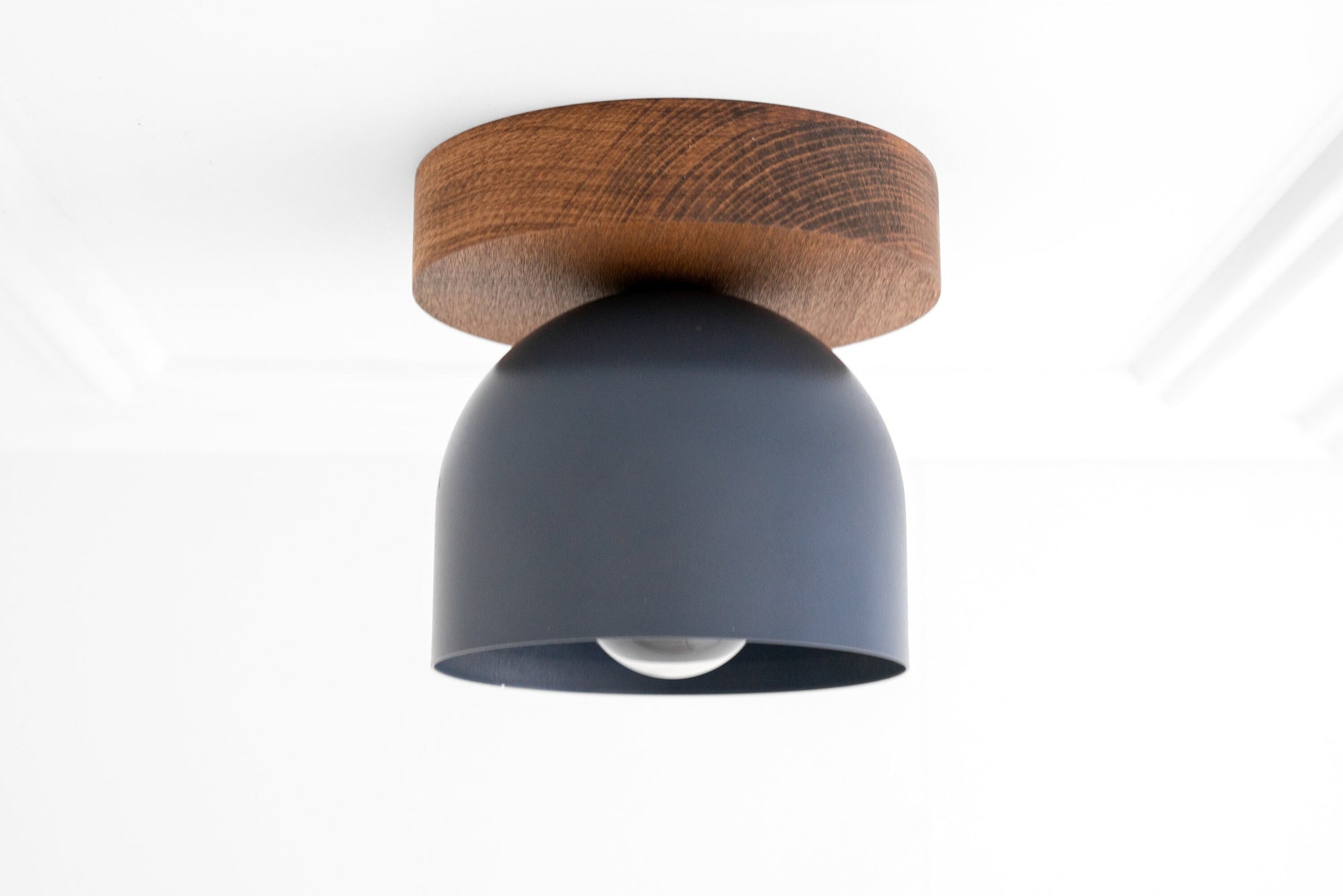 Flush mount ceiling light with matte black shade and natural oak wood base. - CEILING LIGHT MODEL NO. 1107