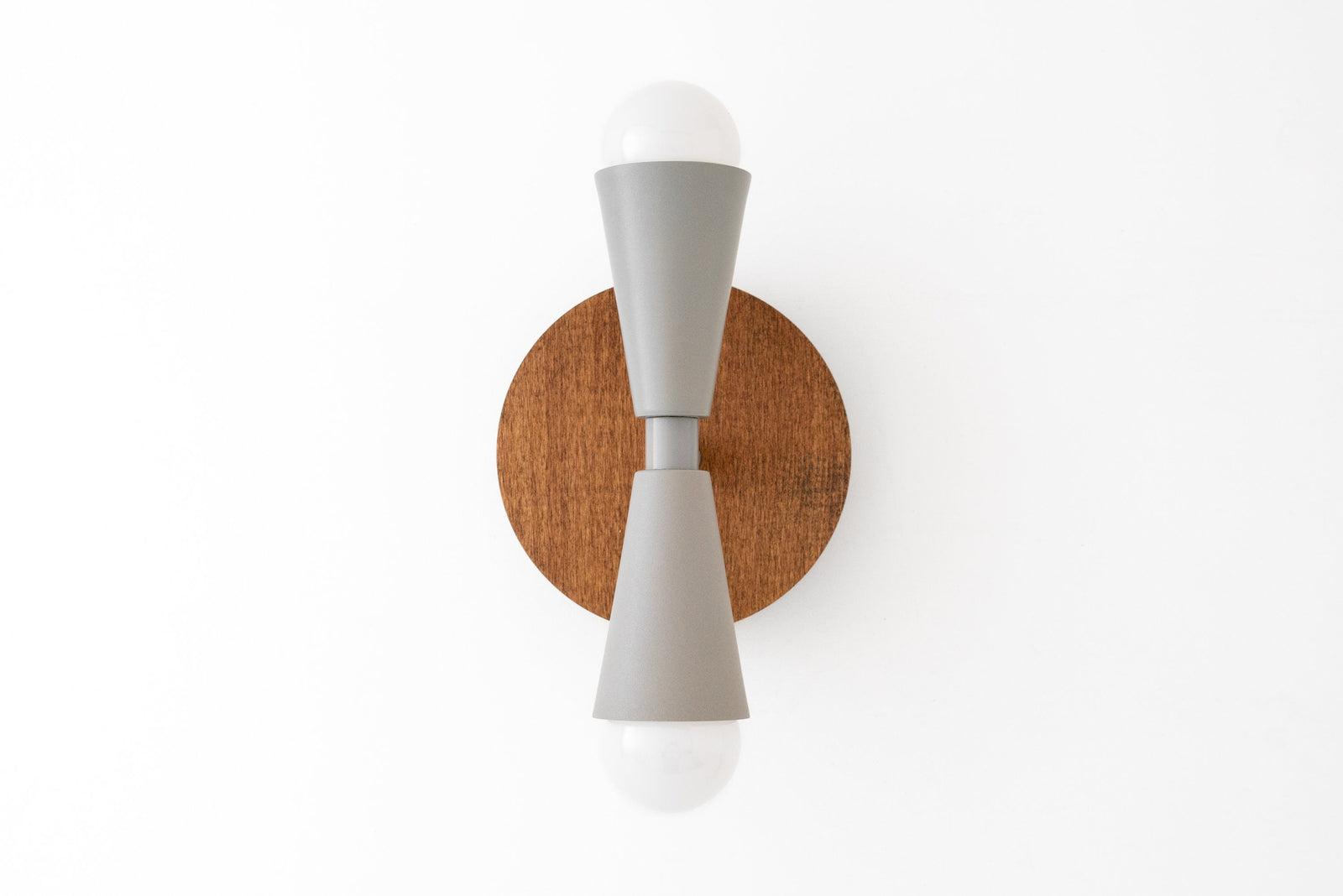 Scandinavian style wall sconce with oak wood backplate and gray double cone metal arms holding exposed bulbs. - SCONCE MODEL NO. 4717
