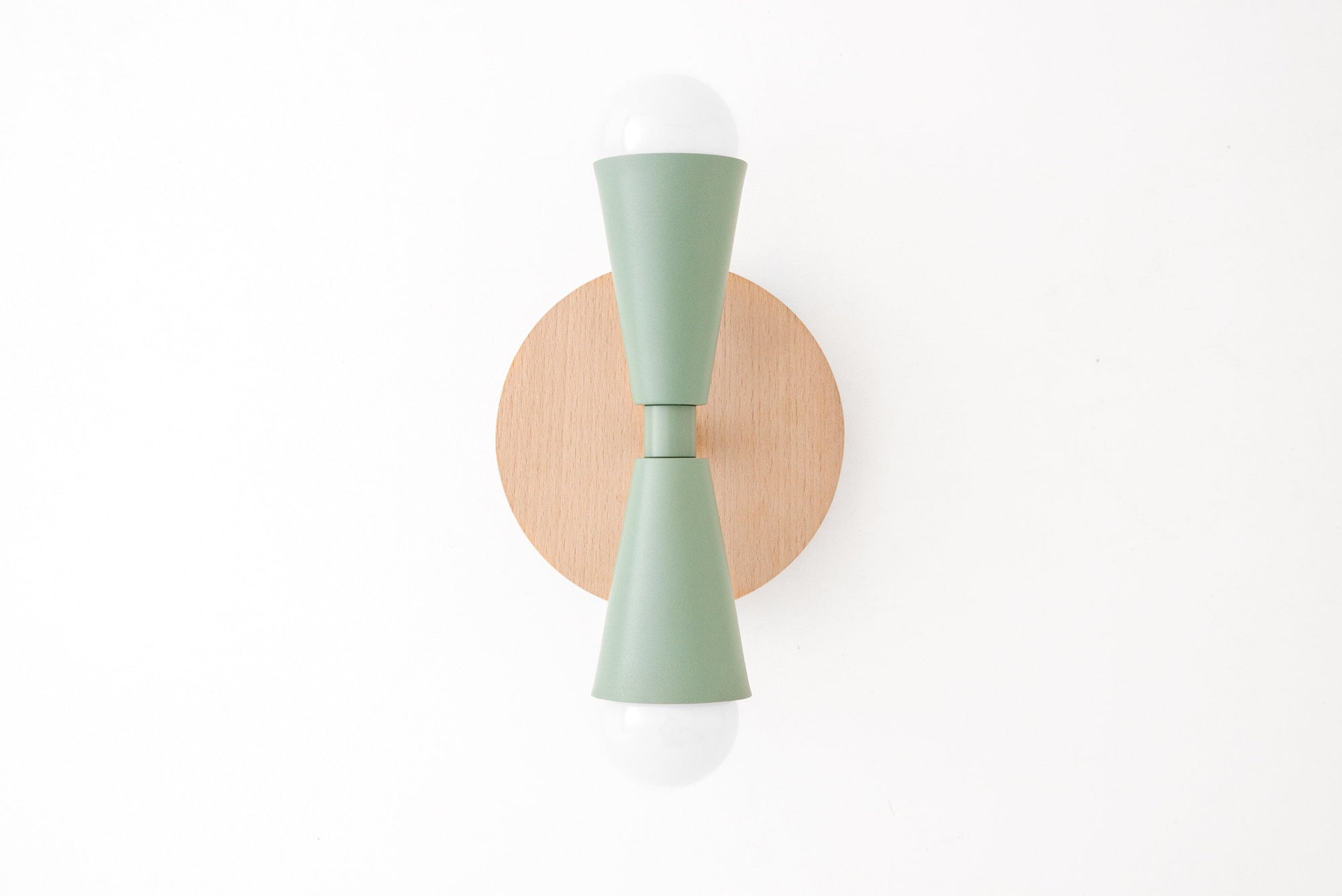 Scandinavian-style beechwood sconce with matte green double-cone metal shade and exposed white bulbs. - SCONCE MODEL NO. 4717