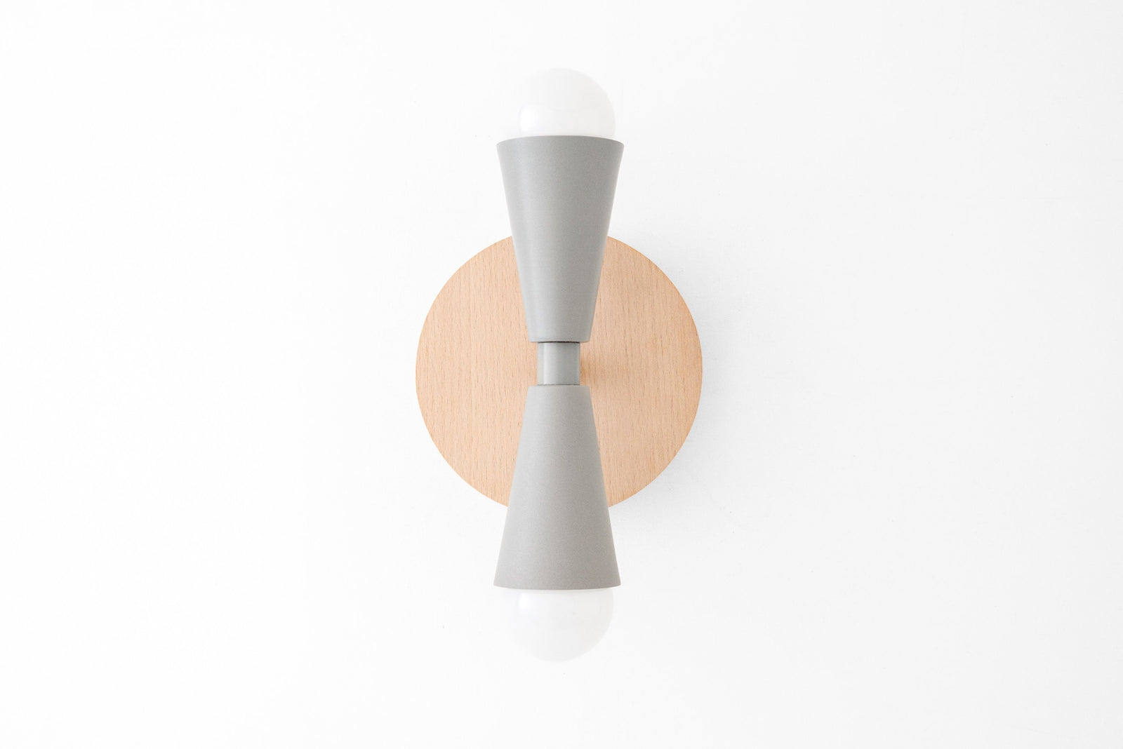Scandinavian-style wall sconce with natural beechwood backplate and gray double cone metal shades, bare bulbs visible. - SCONCE MODEL NO. 4717