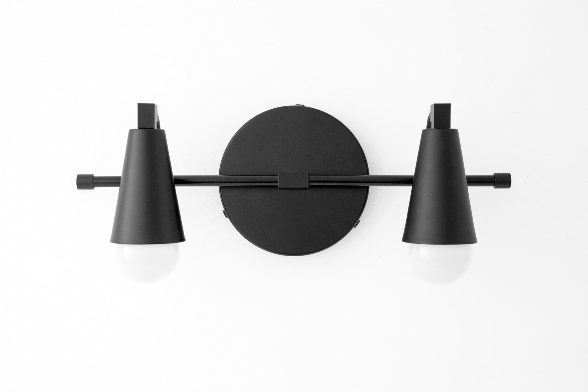 Black industrial two-bulb vanity light with conical shades and round wall mount. - VANITY LIGHT MODEL NO. 1229