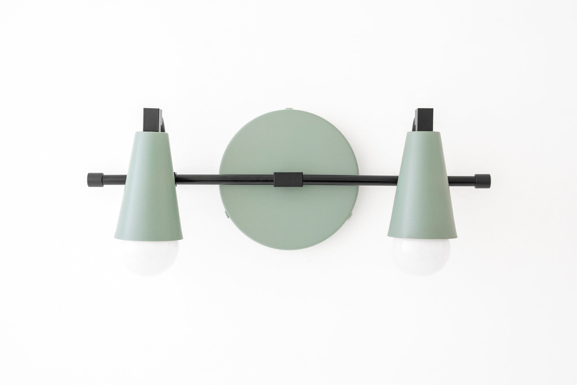 Industrial style vanity light with two mint green conical shades and matte black metal accents. - VANITY LIGHT MODEL NO. 1229