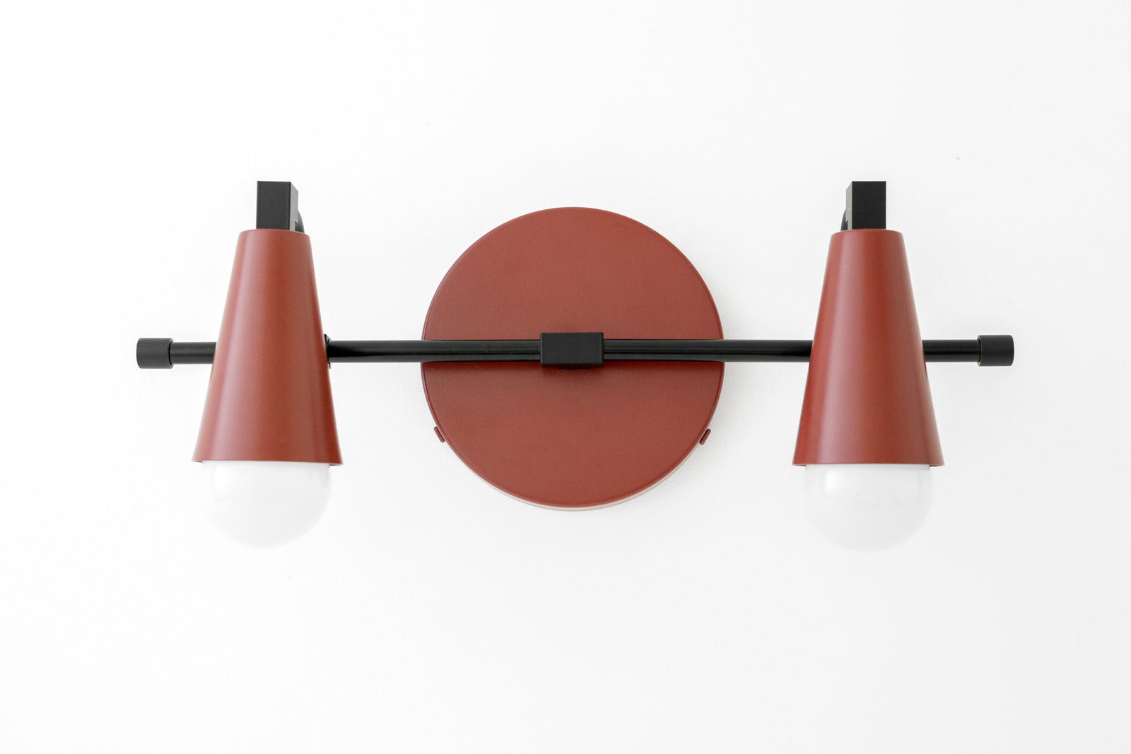 Two-bulb black and brick red industrial vanity light with conical shades and round backplate. - VANITY LIGHT MODEL NO. 1229