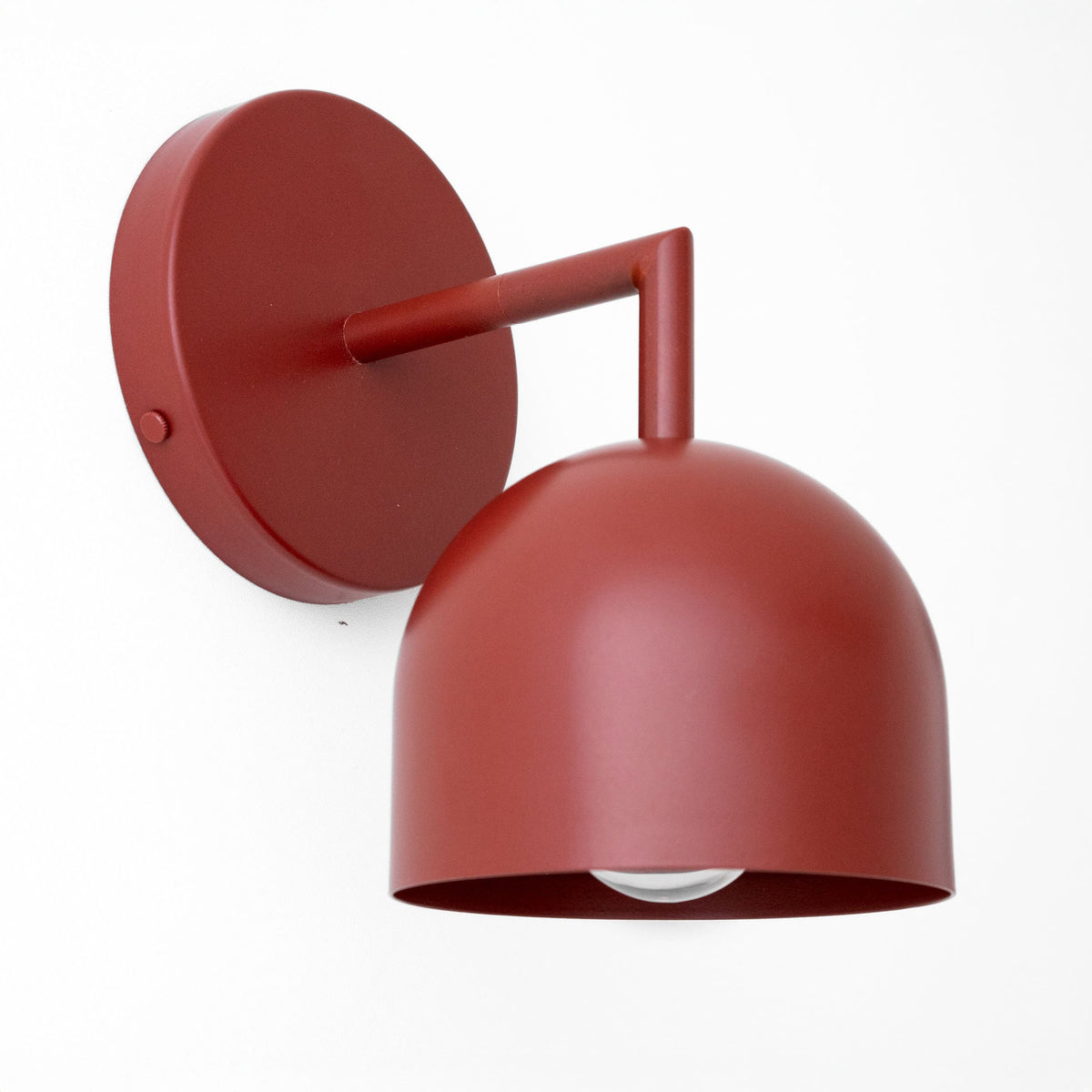 Brick red Scandinavian-style metal wall sconce with dome shade and exposed bulb, semi-flush mount. - SCONCE MODEL NO. 4250