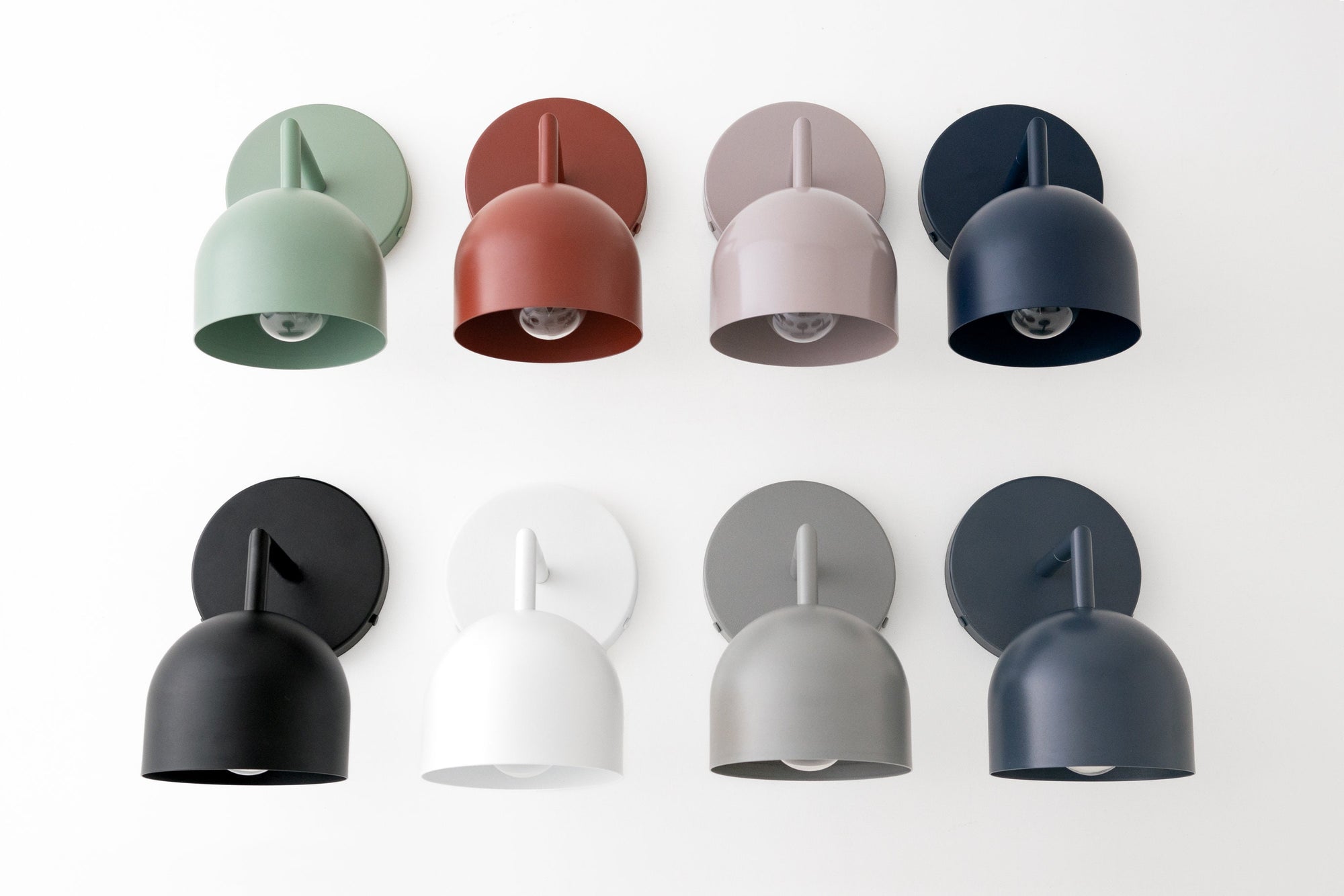 Eight semi-flush wall sconces in green, brick red, mauve, coal blue, black, white, gray, and dark blue with cylindrical. - SCONCE MODEL NO. 4250