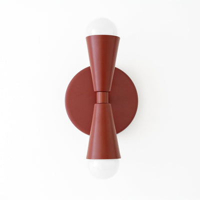 Art Deco style wall sconce in brick red with up/down bare bulbs and round backplate. - SCONCE MODEL NO. 4717