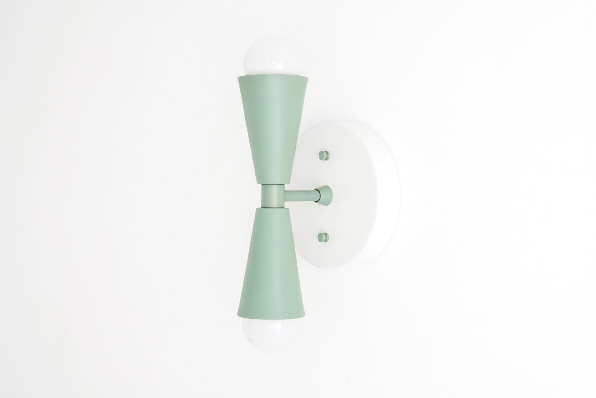 Art Deco style wall sconce in matte green with bare bulbs up and down mounted on white round base. - SCONCE MODEL NO. 4717