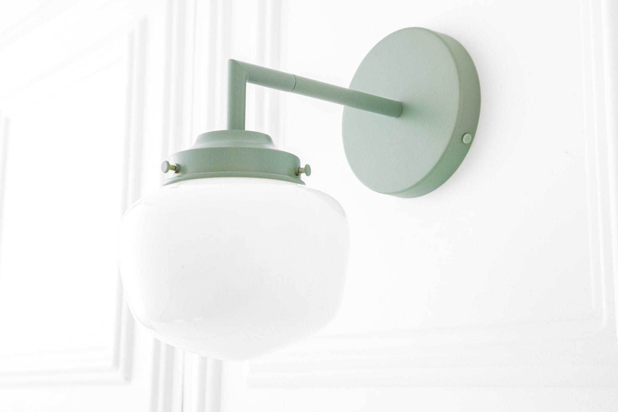 Matte green metal semi-flush mount sconce with a white frosted globe shade and round wall plate. - SCONCE MODEL NO. 4260