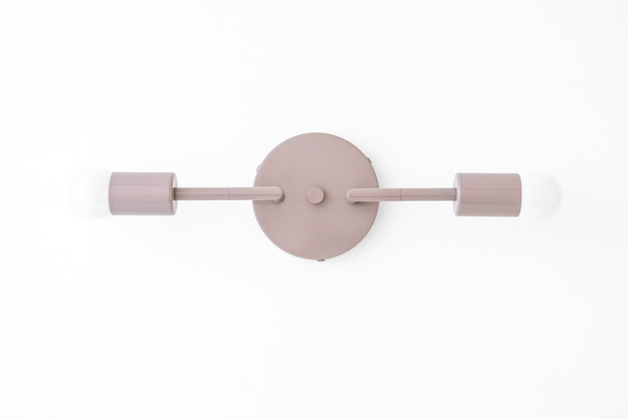 Mid-century modern mauve two-bulb vanity light with bare bulbs and round wall mount. - VANITY LIGHT MODEL NO. 1938
