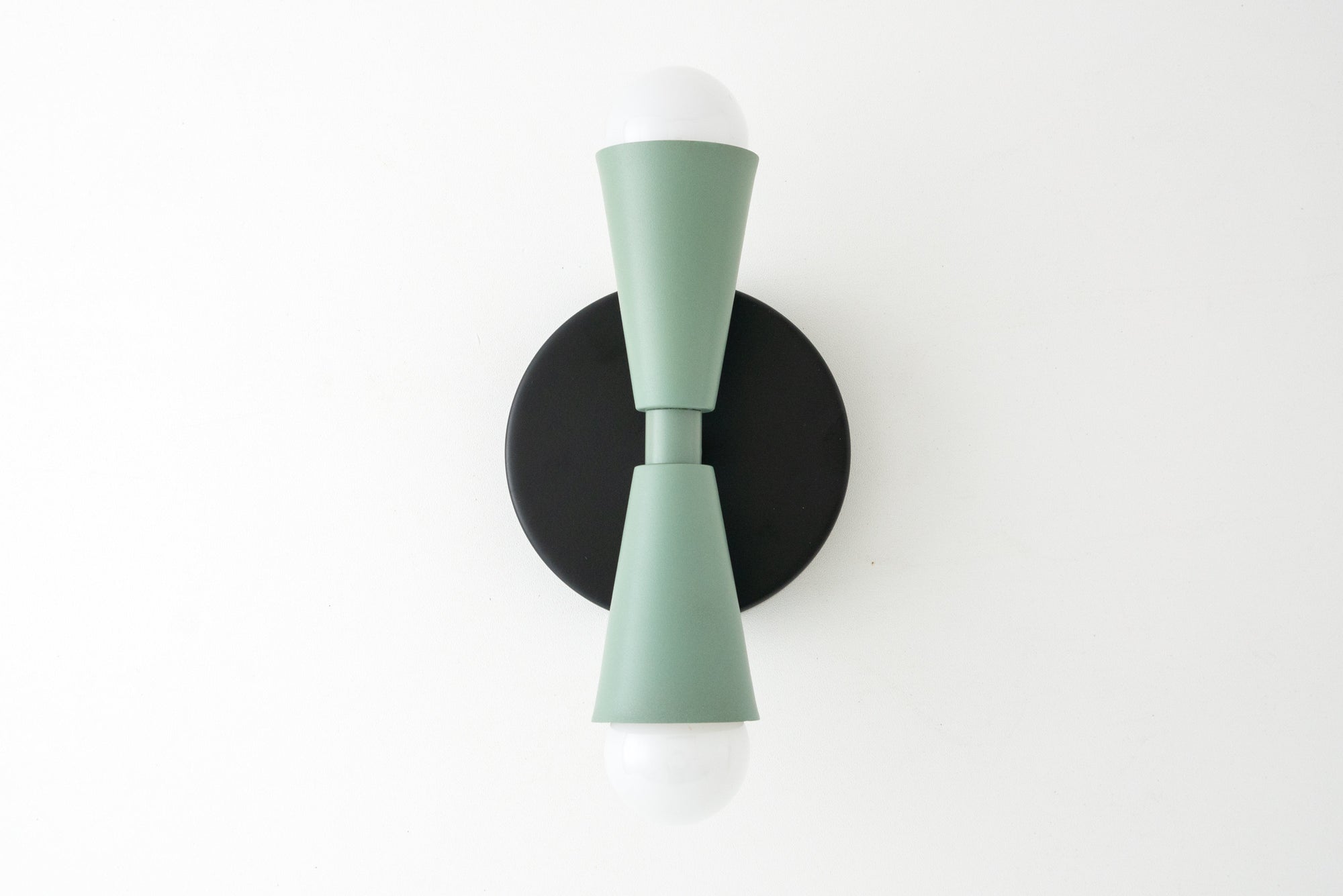 Art Deco green metal semi-flush sconce with upward and downward bulbs on black circular base. - SCONCE MODEL NO. 4717