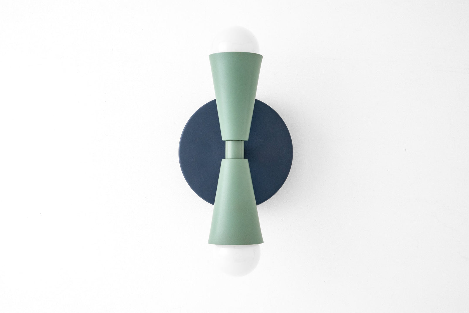 Art Deco style sconce with coal blue circular backplate and matte green double cone arms holding bare bulbs up and down. - SCONCE MODEL NO. 4717