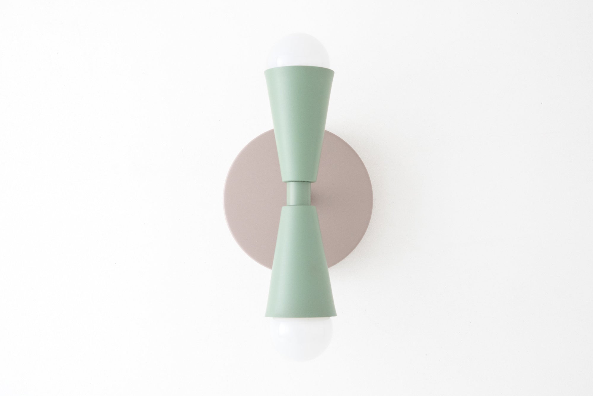 Art Deco mint green metal sconce with two exposed bulbs and round beige wall mount. - SCONCE MODEL NO. 4717