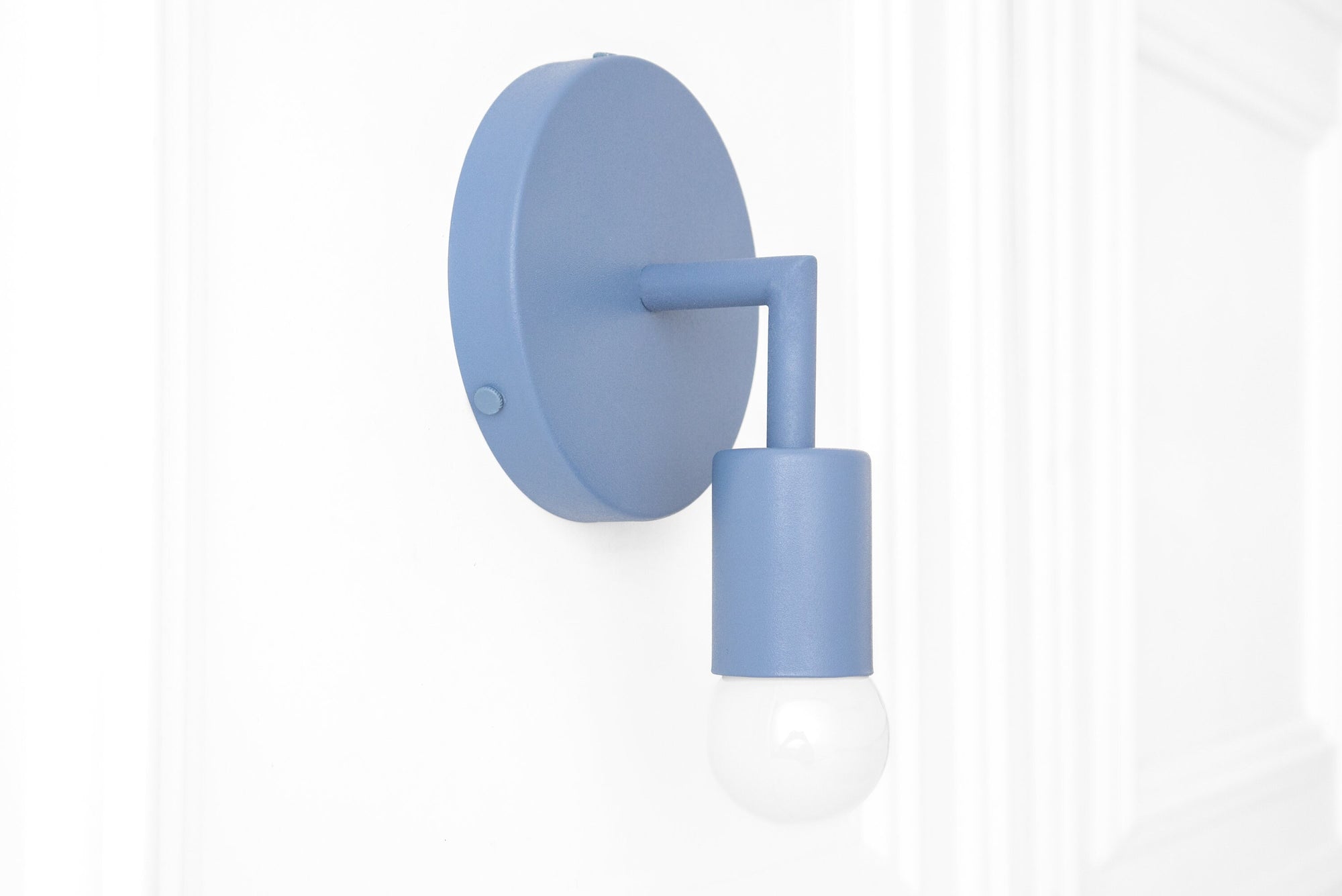 Scandinavian-style blue metal wall sconce with exposed bulb and round backplate. - SCONCE MODEL NO. 5480