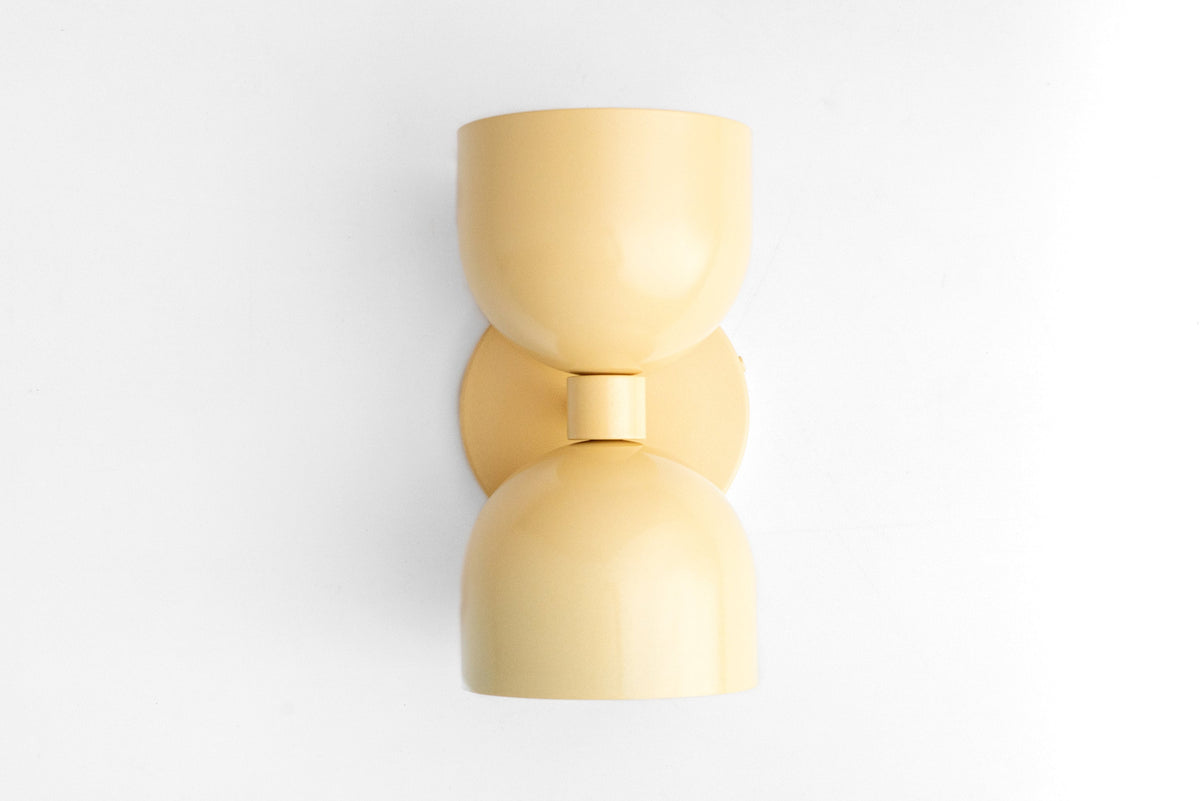 Mid-century modern yellow double-shade wall sconce with up/down light design. - SCONCE MODEL NO. 5641