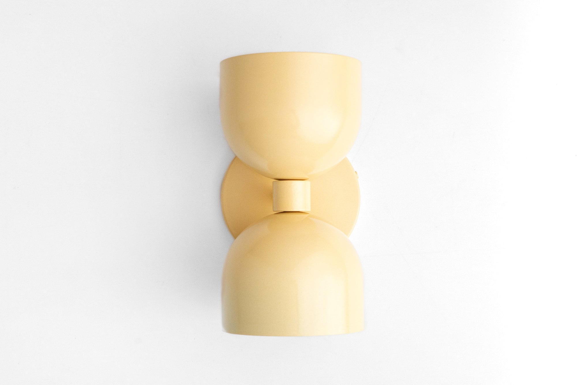 Mid-century modern yellow double-shade wall sconce with up/down light design. - SCONCE MODEL NO. 5641