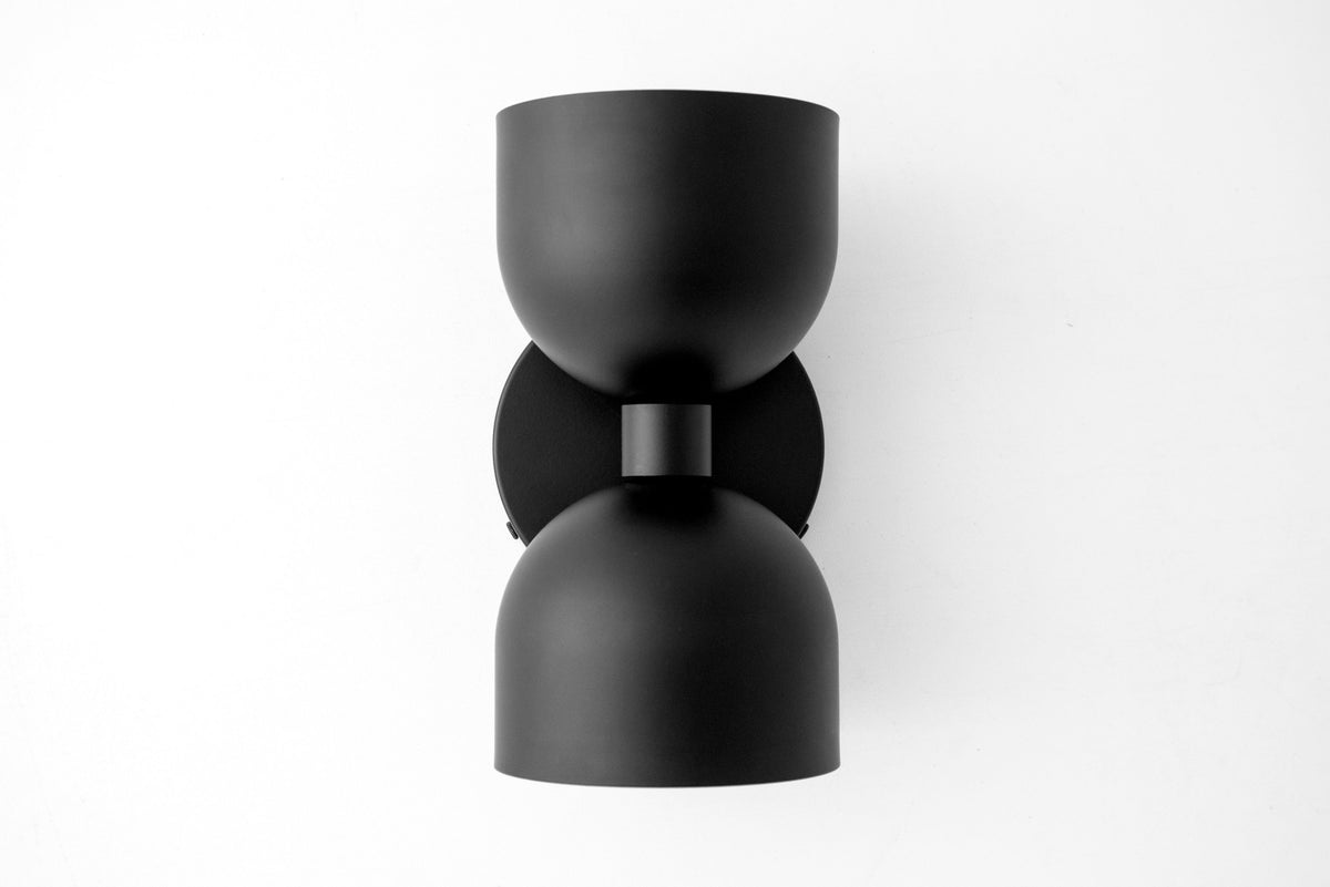 Matte black mid-century modern up/down wall sconce with rounded deep ball shade. - SCONCE MODEL NO. 5641