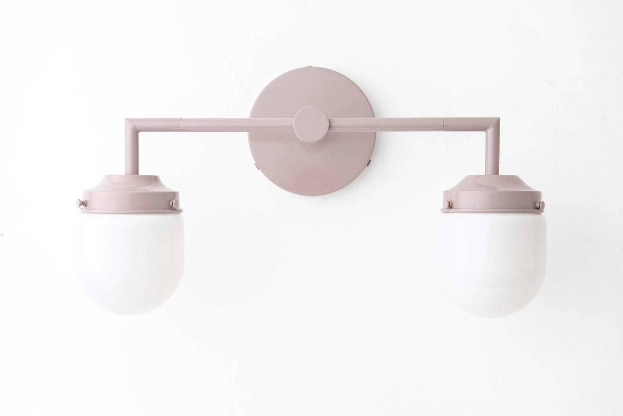 Art Deco style vanity light with mauve metal frame and two white globe bulbs. - VANITY LIGHT MODEL NO. 7536