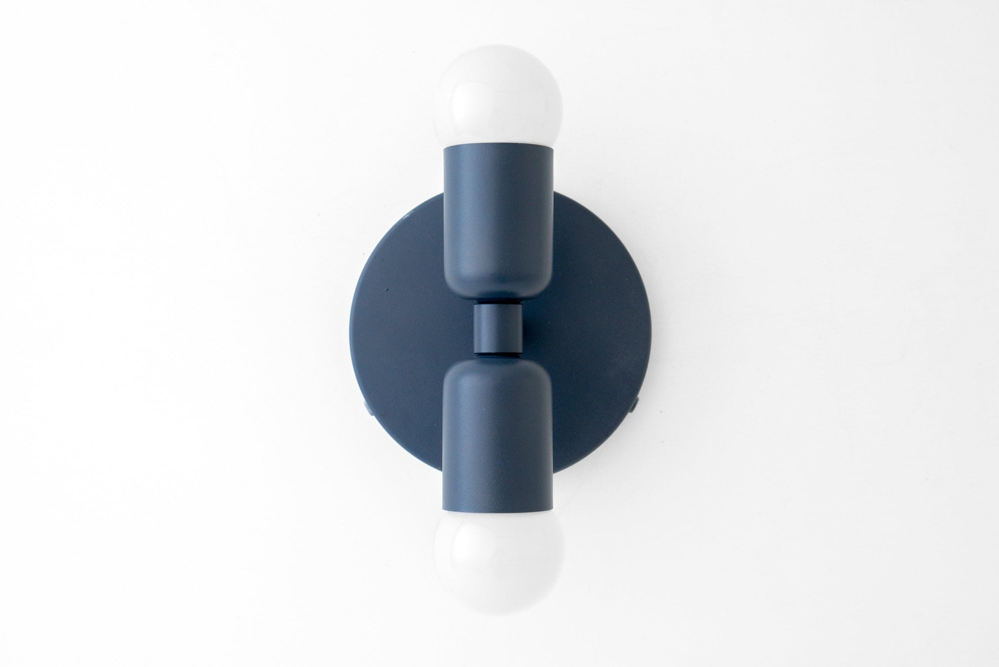 Coal blue mid-century modern metal sconce with up/down bare bulbs and circular backplate. - SCONCE MODEL NO. 2660