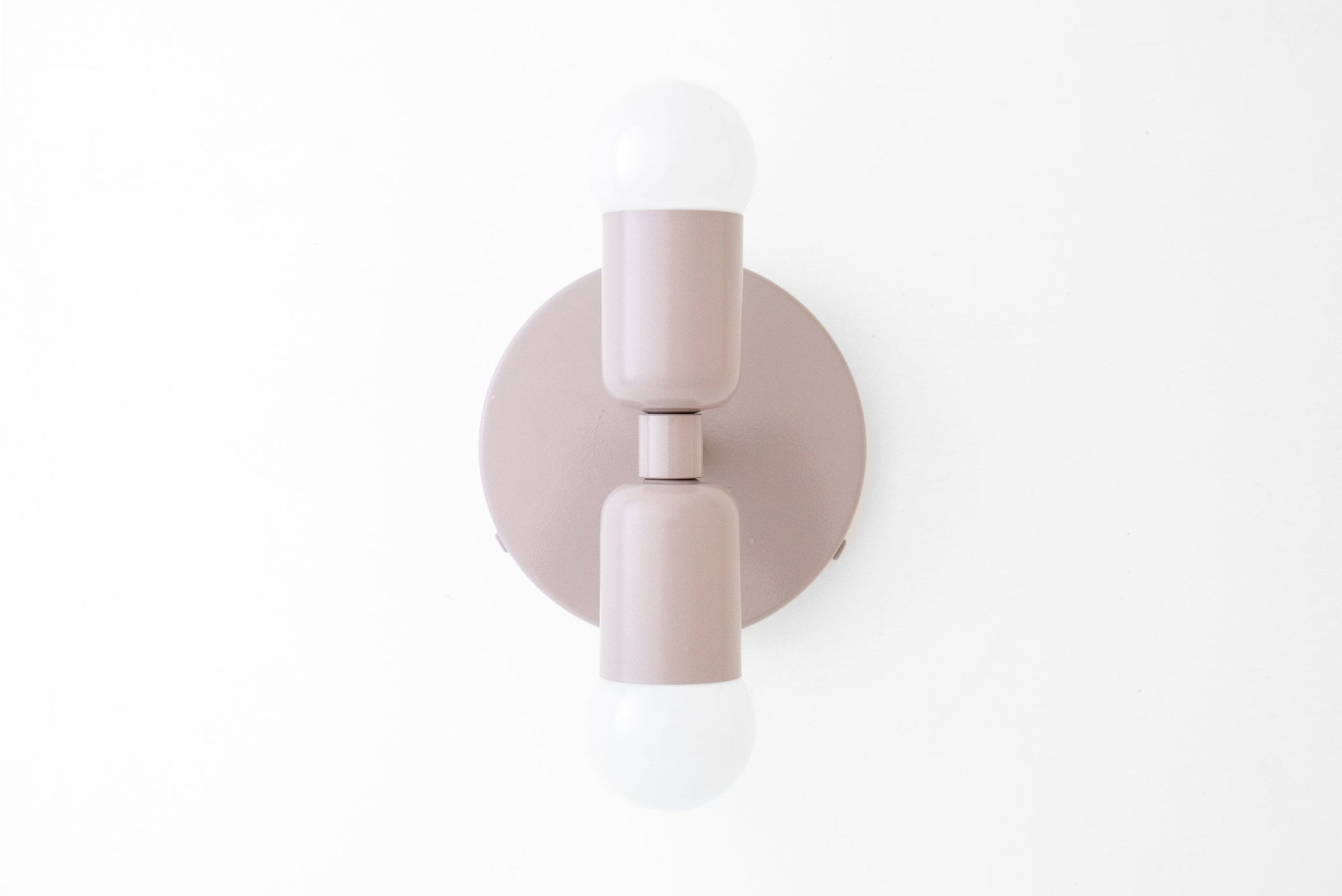 Mid-century modern mauve double-bulb wall sconce with round backplate and matte finish. - SCONCE MODEL NO. 2660