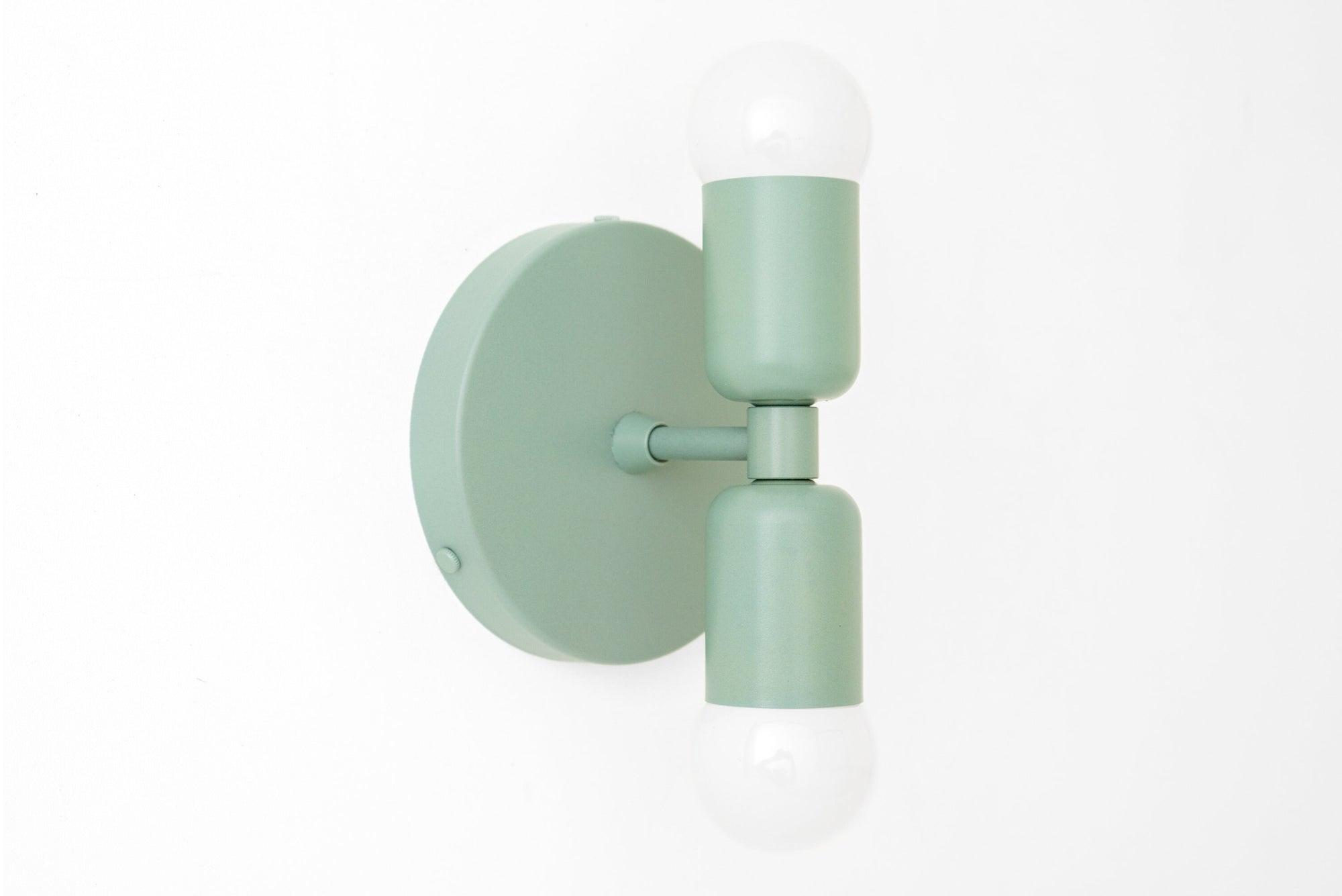 Mid-century modern green double bare bulb wall sconce with round mounting plate. - SCONCE MODEL NO. 2660