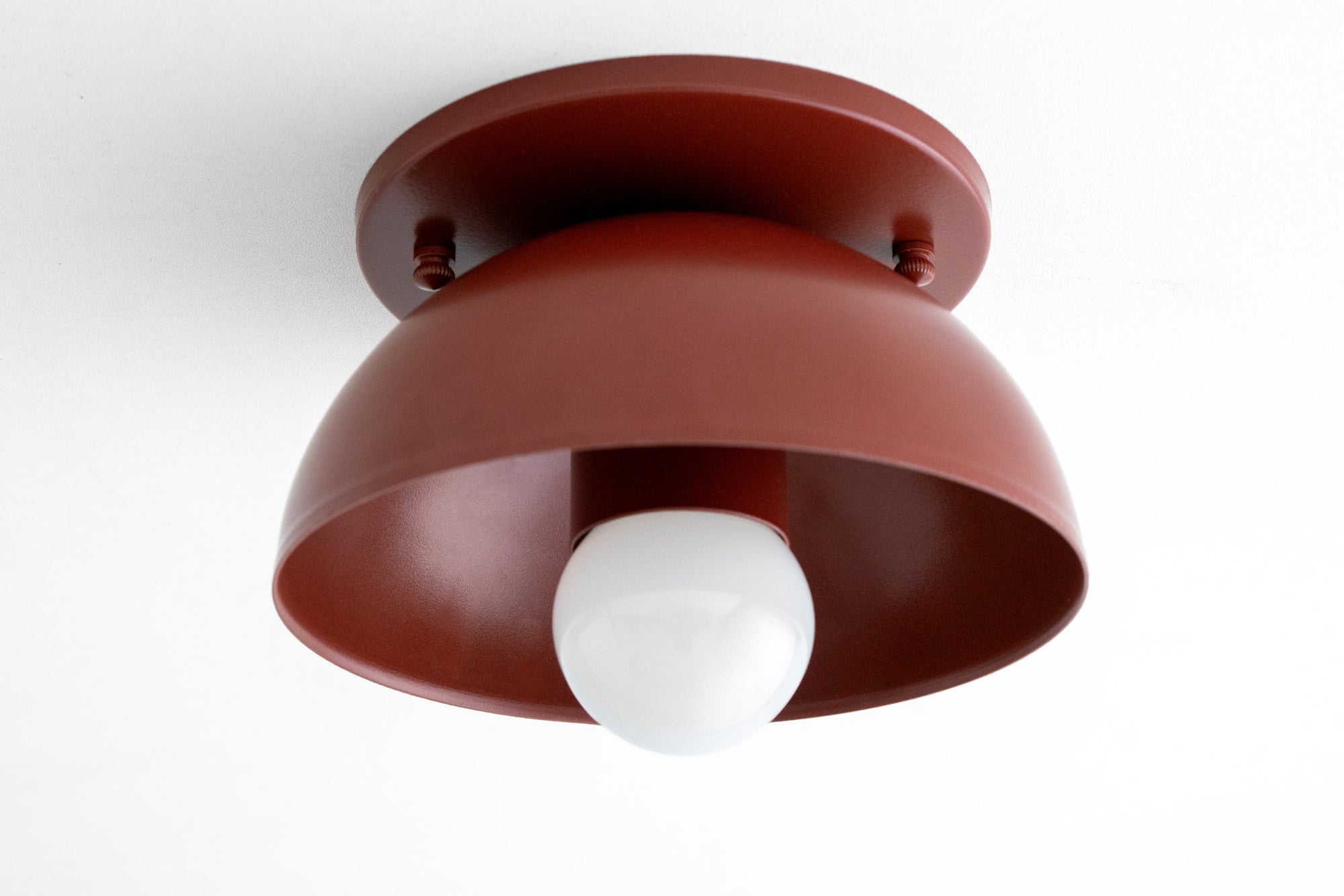 Brick red Scandinavian flush mount ceiling light with dome-shaped metal shade and exposed bulb. - CEILING LIGHT MODEL NO. 4812