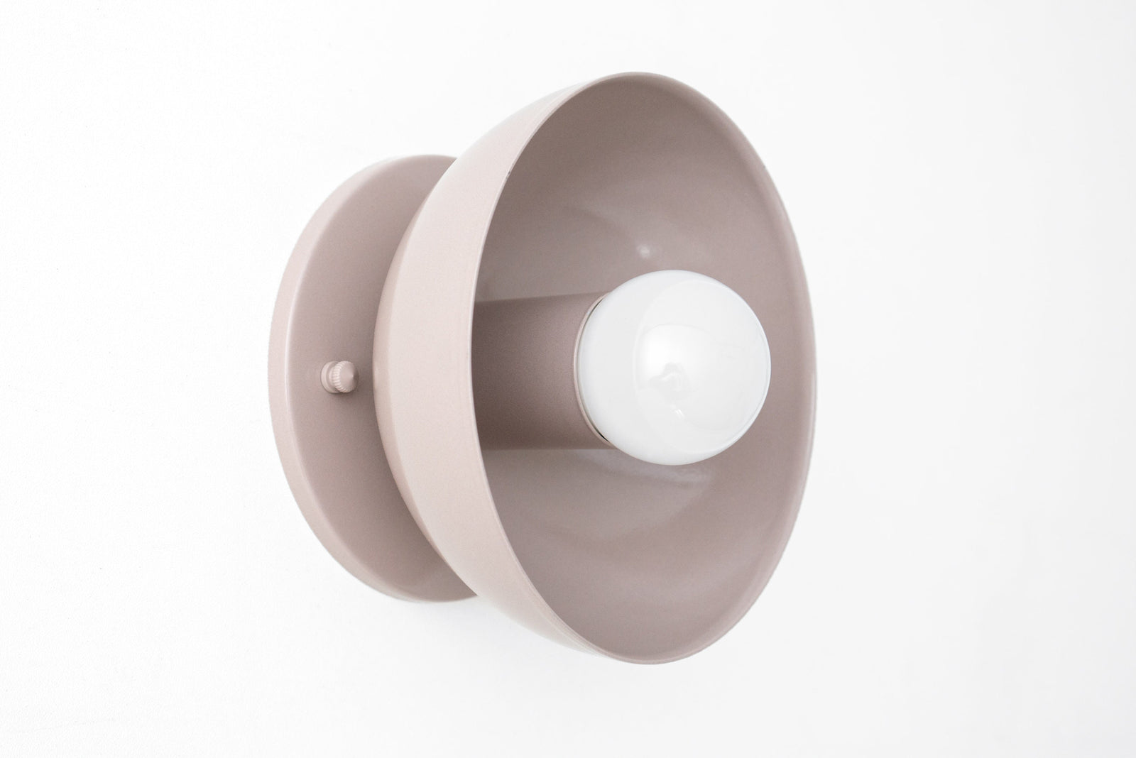 Matte mauve Scandinavian-style flush mount sconce with exposed white bulb. - SCONCE MODEL NO. 4812
