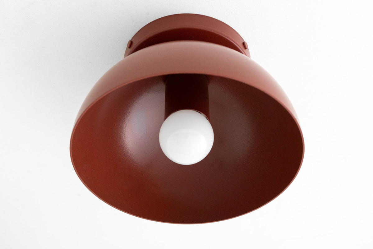 Brick red dome-shaped flush mount ceiling light with smooth matte finish and visible bulb. - CEILING LIGHT MODEL NO. 9105