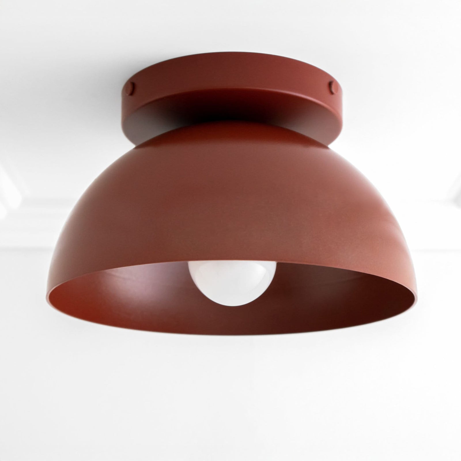 Brick red dome-shaped flush mount ceiling light with matte finish and exposed bulb. - CEILING LIGHT MODEL NO. 9105