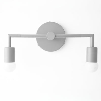 Matte gray two-bulb vanity light with cylindrical shades and round wall mount. - VANITY LIGHT MODEL NO. 1561