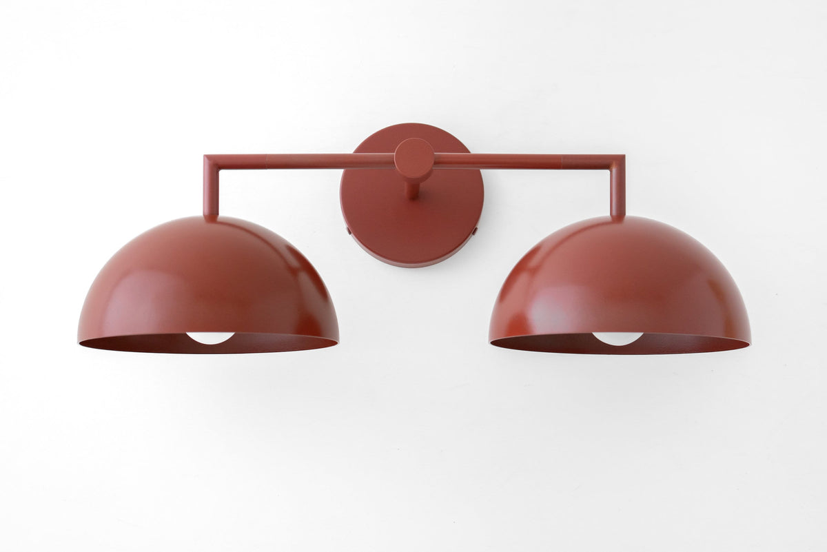 Brick red double dome vanity light with matte finish and minimalist mounting plate. - VANITY LIGHT MODEL NO. 6074