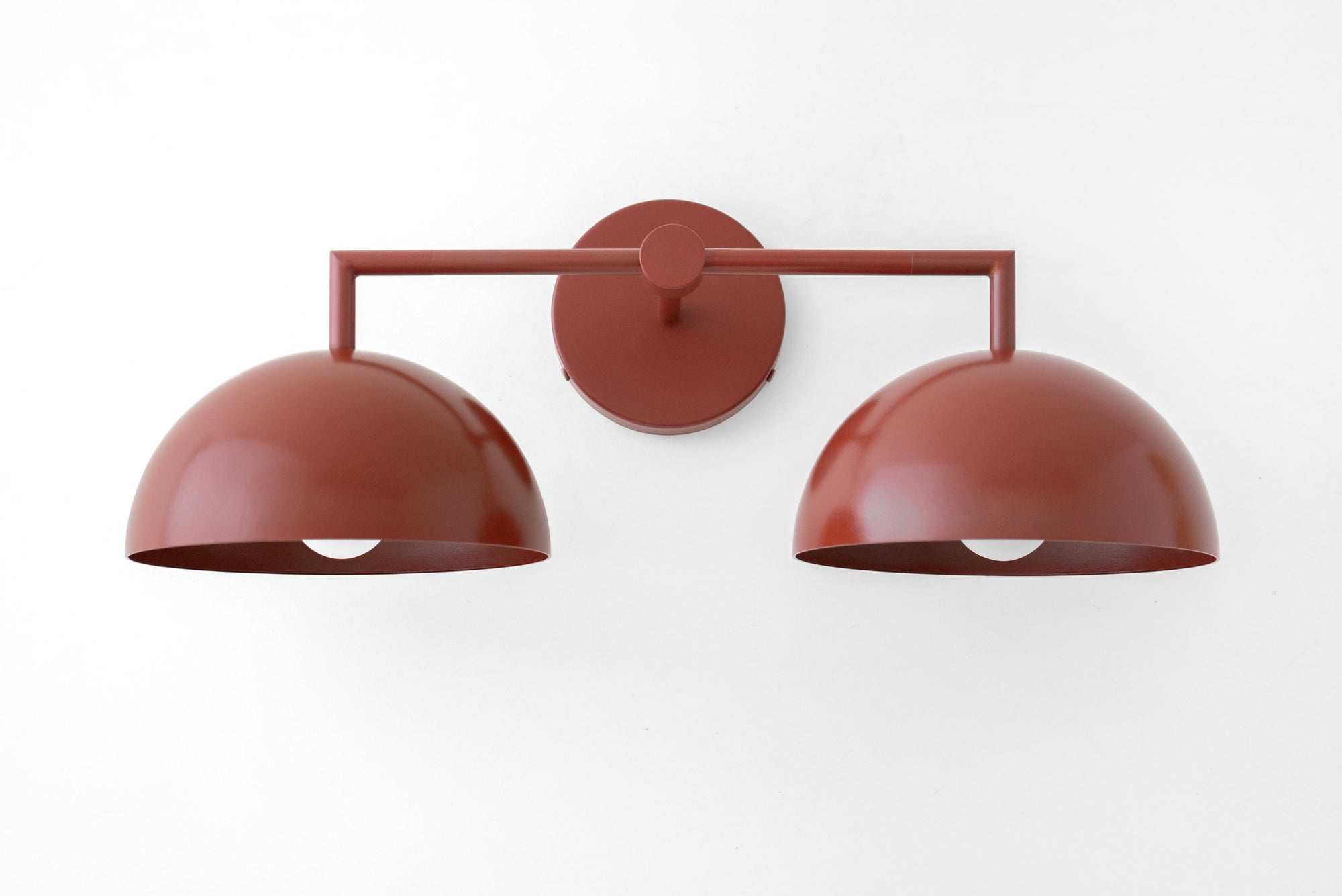 Brick red two-bulb vanity light with smooth dome-shaped metal shades and matte finish. - VANITY LIGHT MODEL NO. 6074