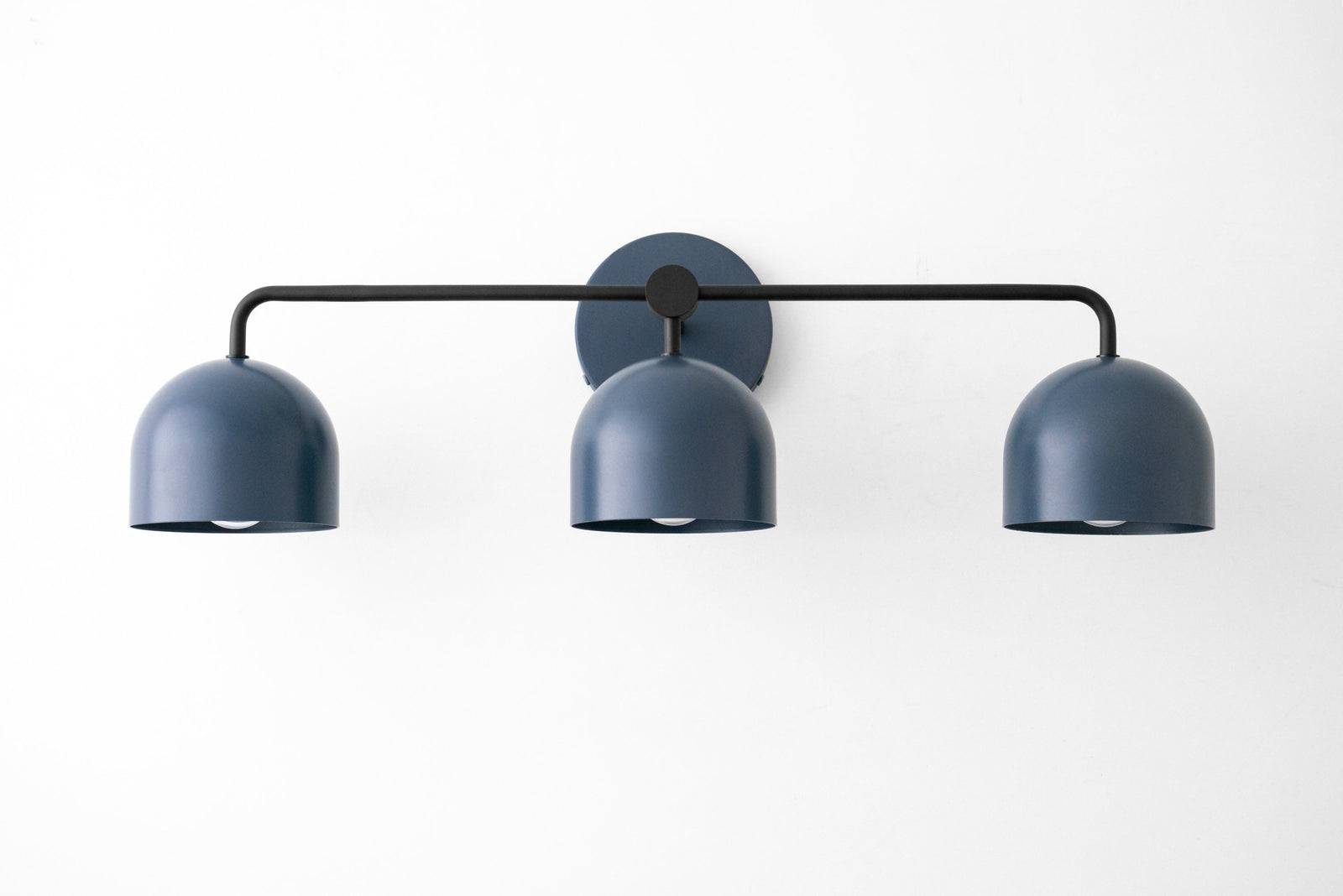 Mid-century modern 3-bulb vanity light in matte black with rounded shades and horizontal bar mount. - VANITY LIGHT MODEL NO. 7456