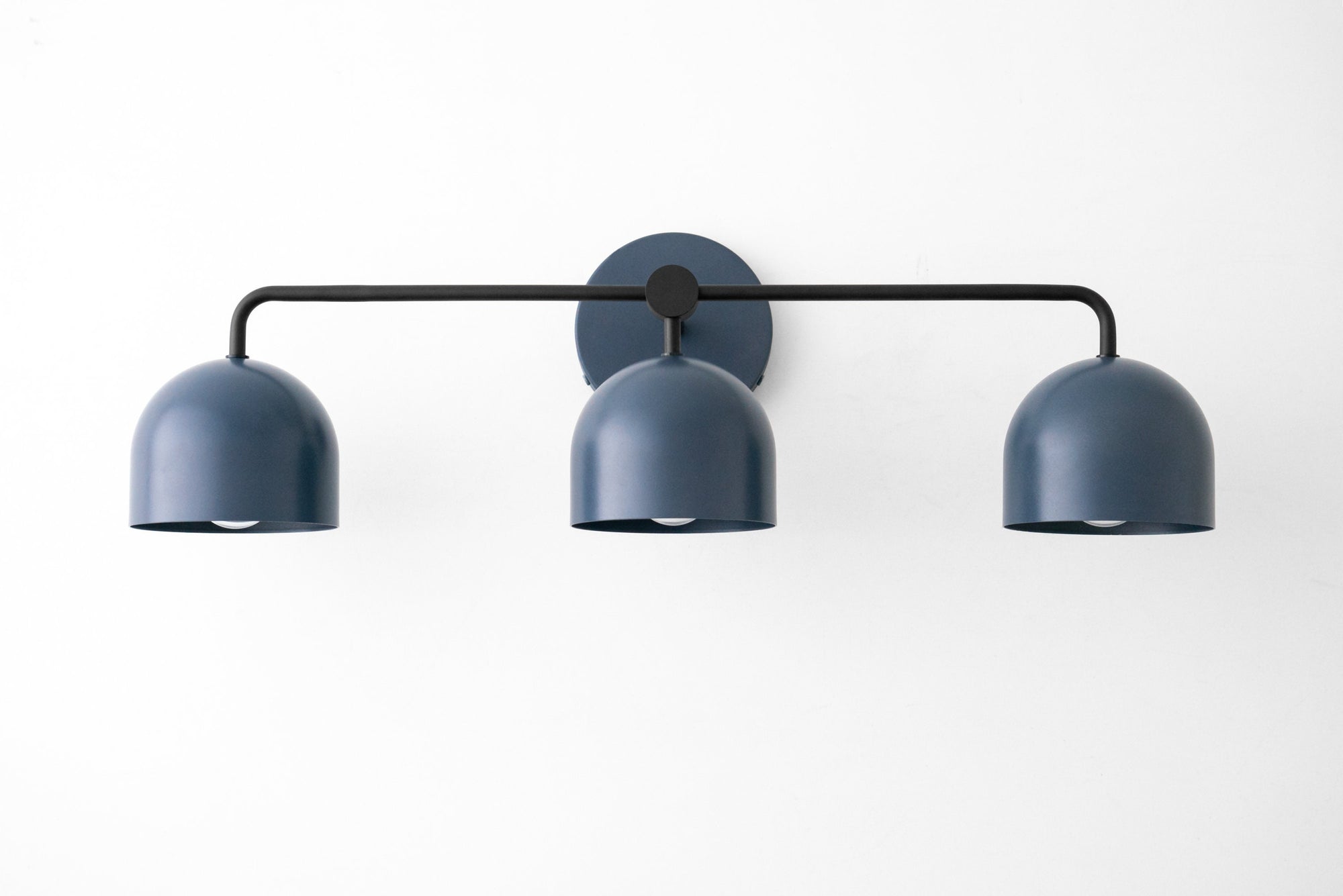 Mid-century modern 3-bulb vanity light in matte black with rounded shades and horizontal bar mount. - VANITY LIGHT MODEL NO. 7456