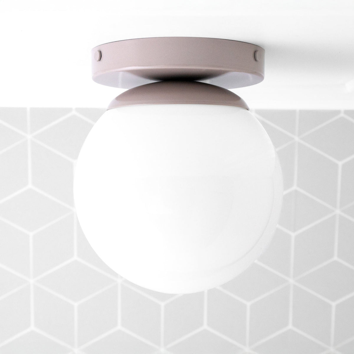 Flush mount ceiling light with mauve round metal base and frosted white globe shade. - CEILING LIGHT MODEL NO. 3825
