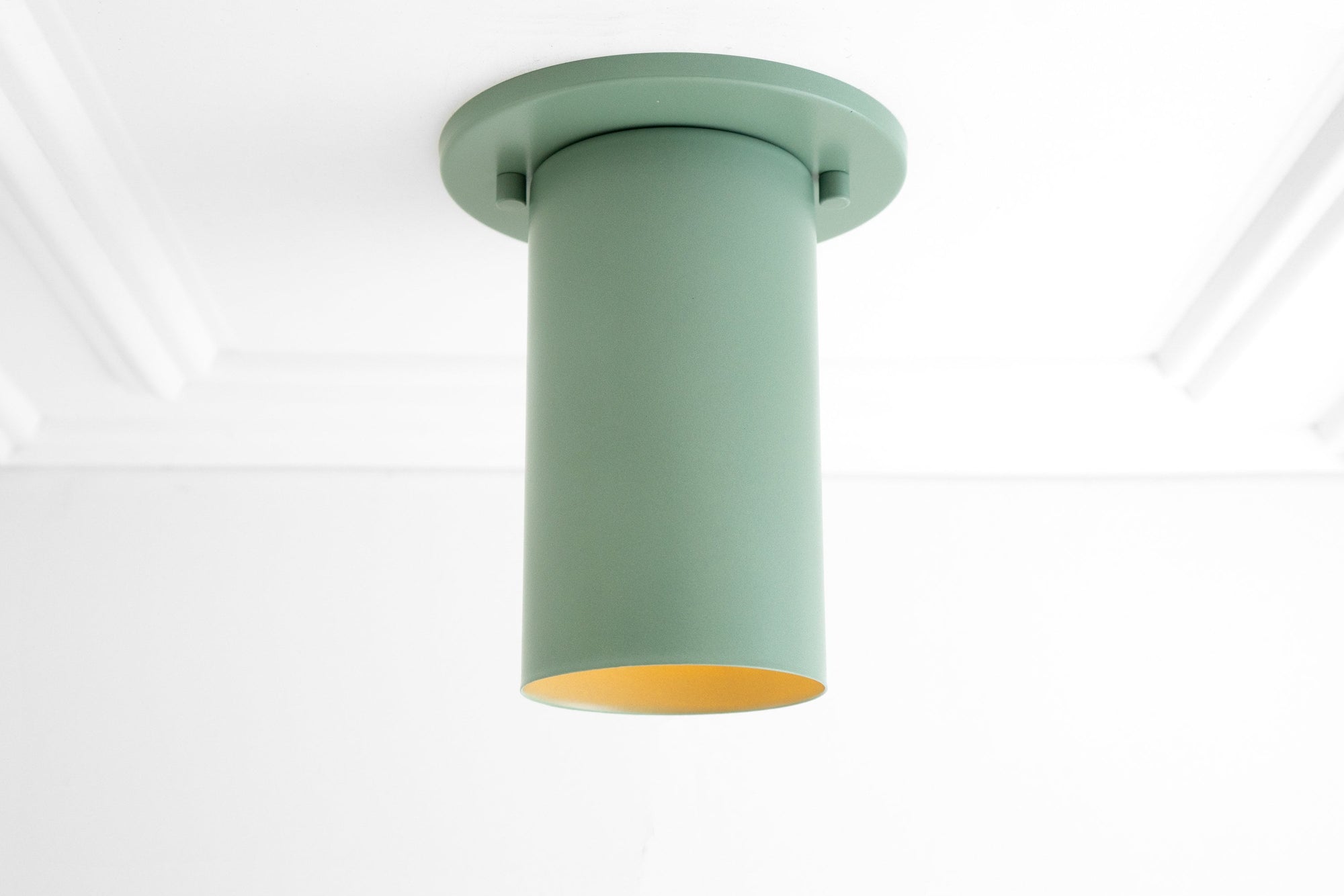 Flush mount ceiling light in matte green with cylindrical shade and brass interior. - CEILING LIGHT MODEL NO. 4771