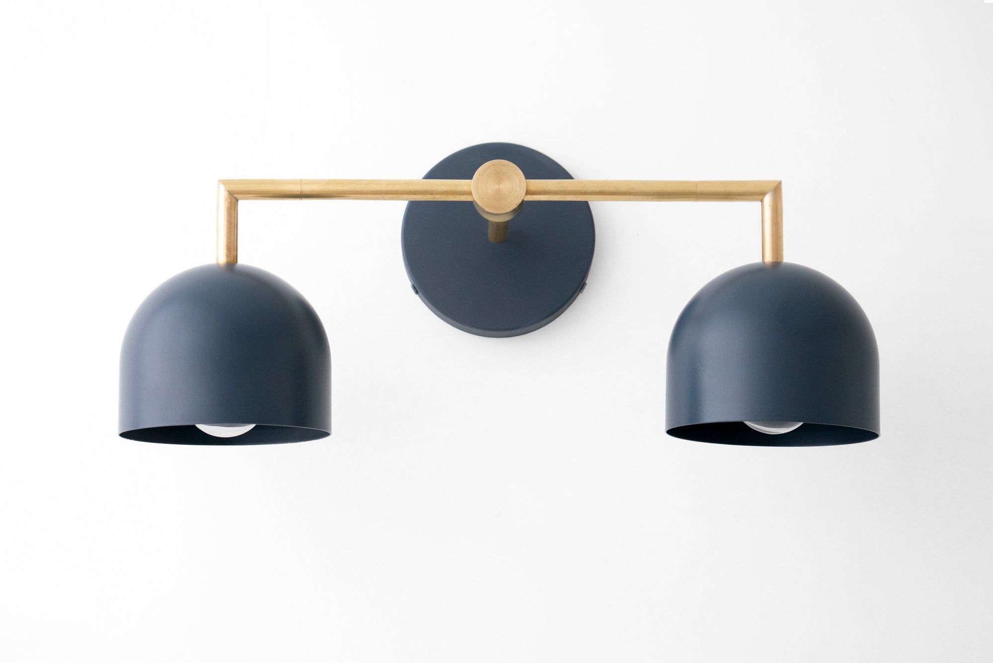 Art Deco style vanity light with raw brass frame and two deep coal blue dome shades. - VANITY LIGHT MODEL NO. 8432